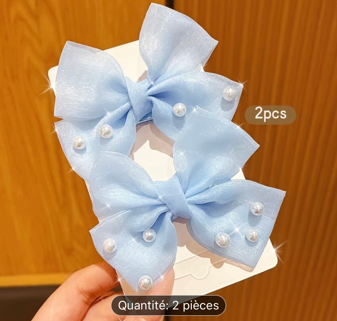 Barrettes nœud bleu perlé