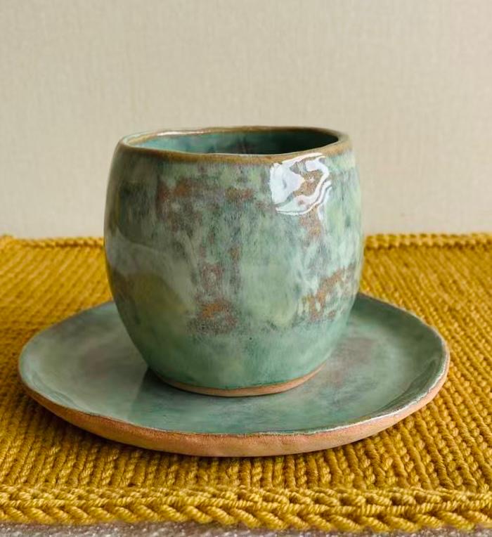 Hand pinched tea cup and saucer