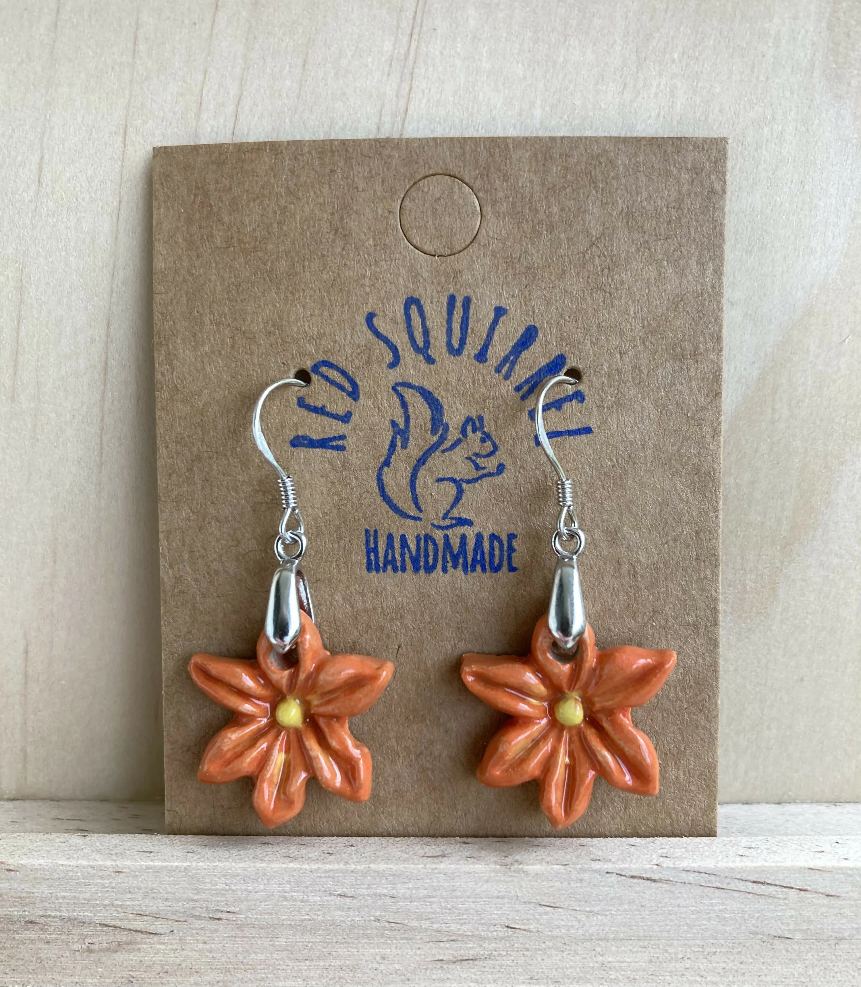 Handmade ceramic clematis flower earrings