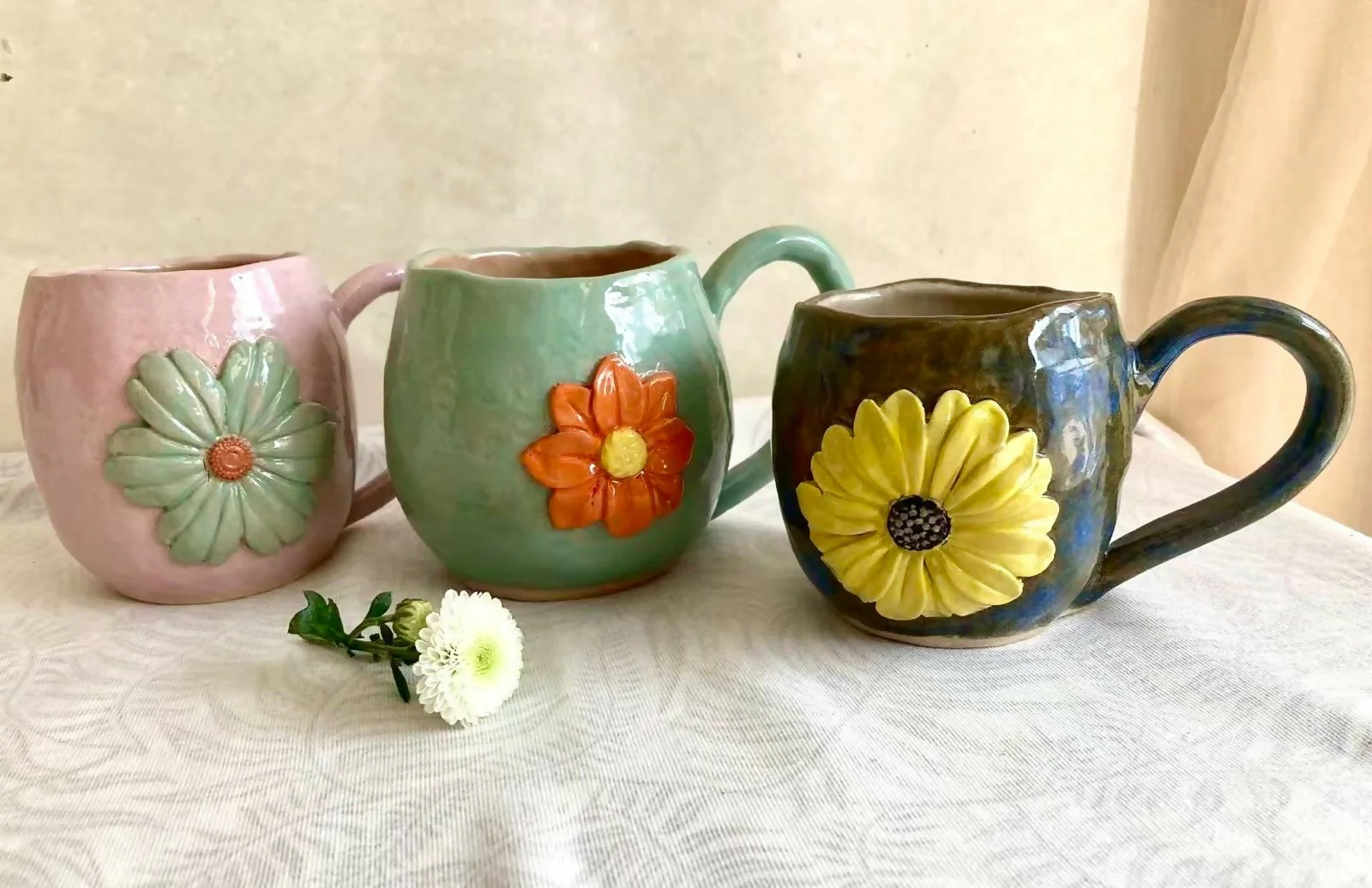 Coil and pinch handmade marigold flower cup