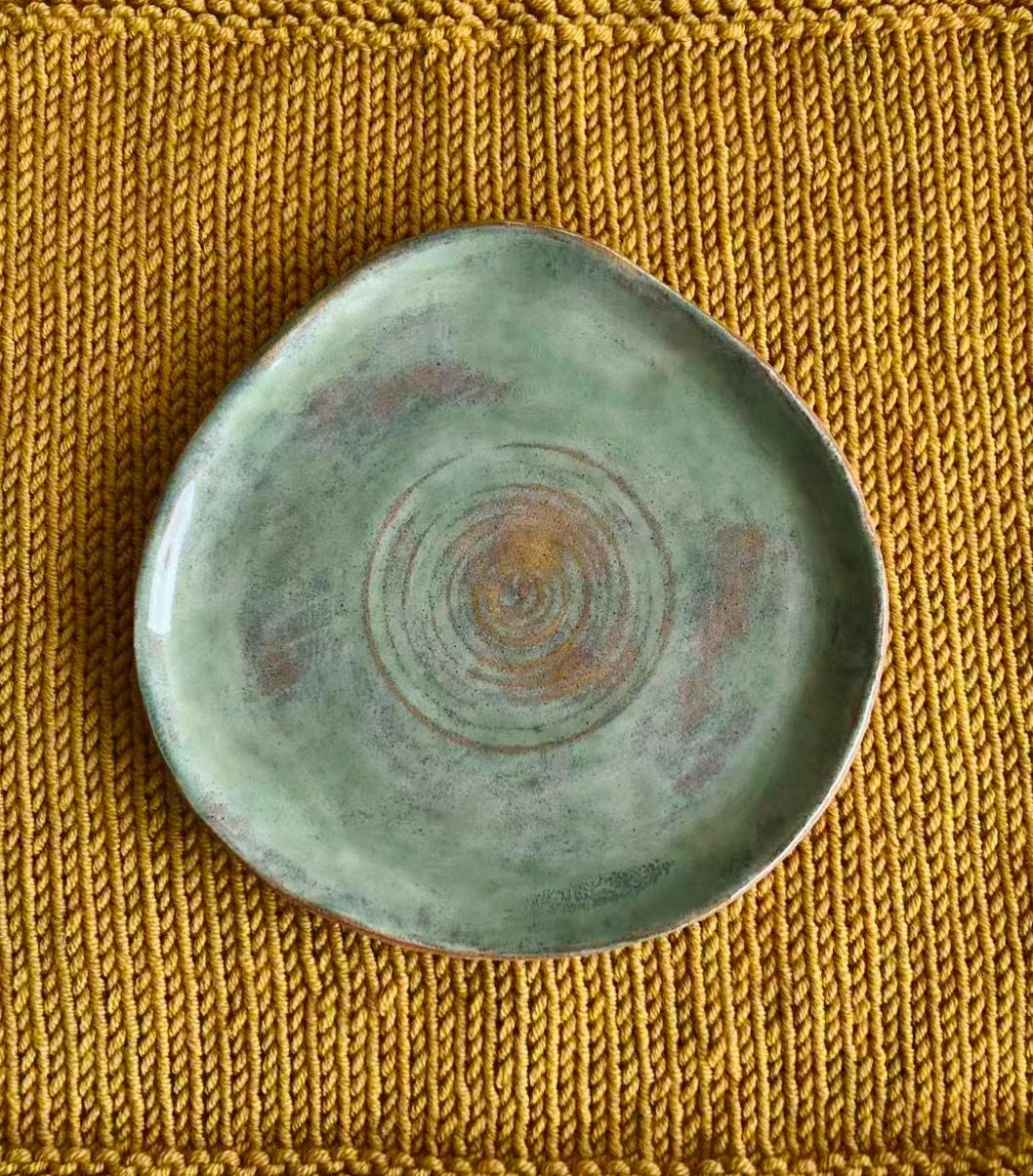 Hand pinched tea cup and saucer