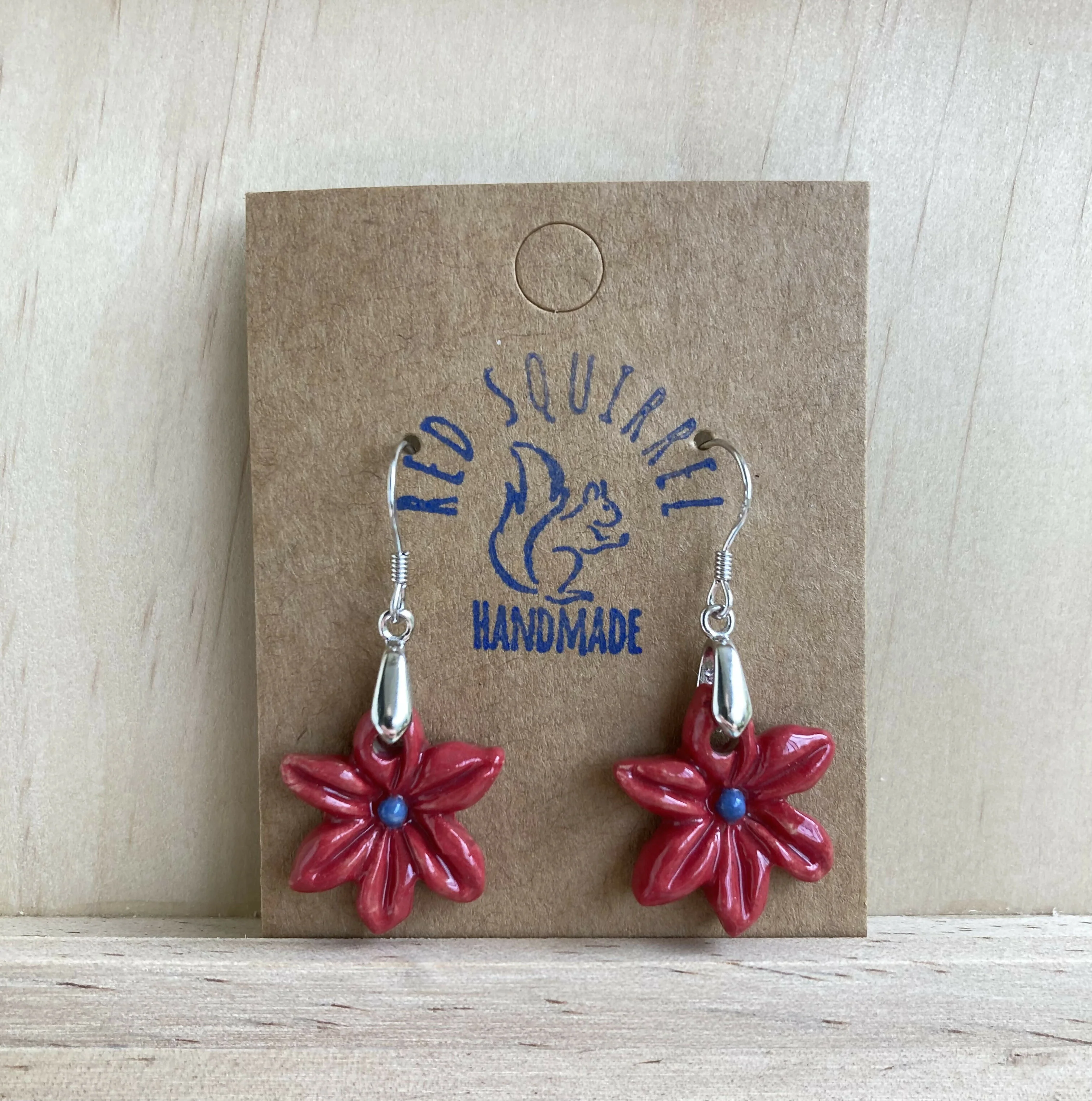 Handmade ceramic clematis flower earrings