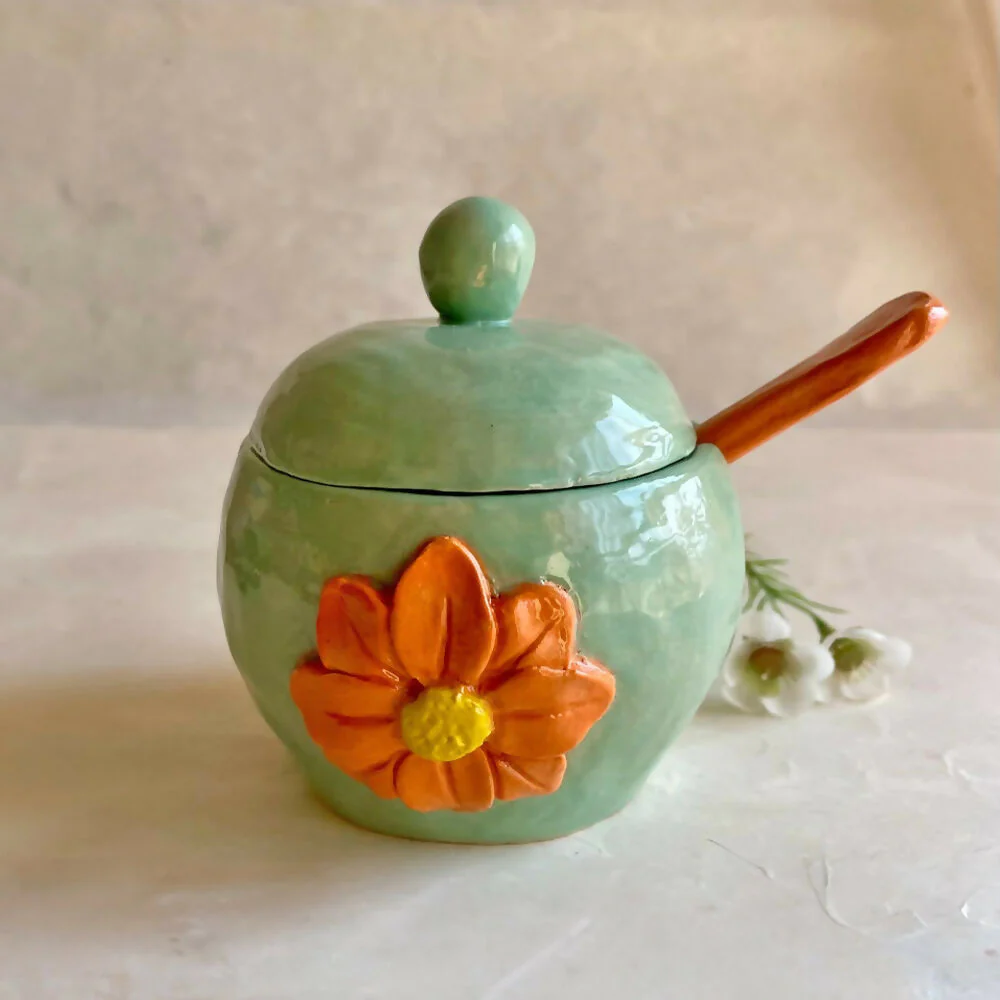 Coil and pinch handmade marigold flower bowl with spoon