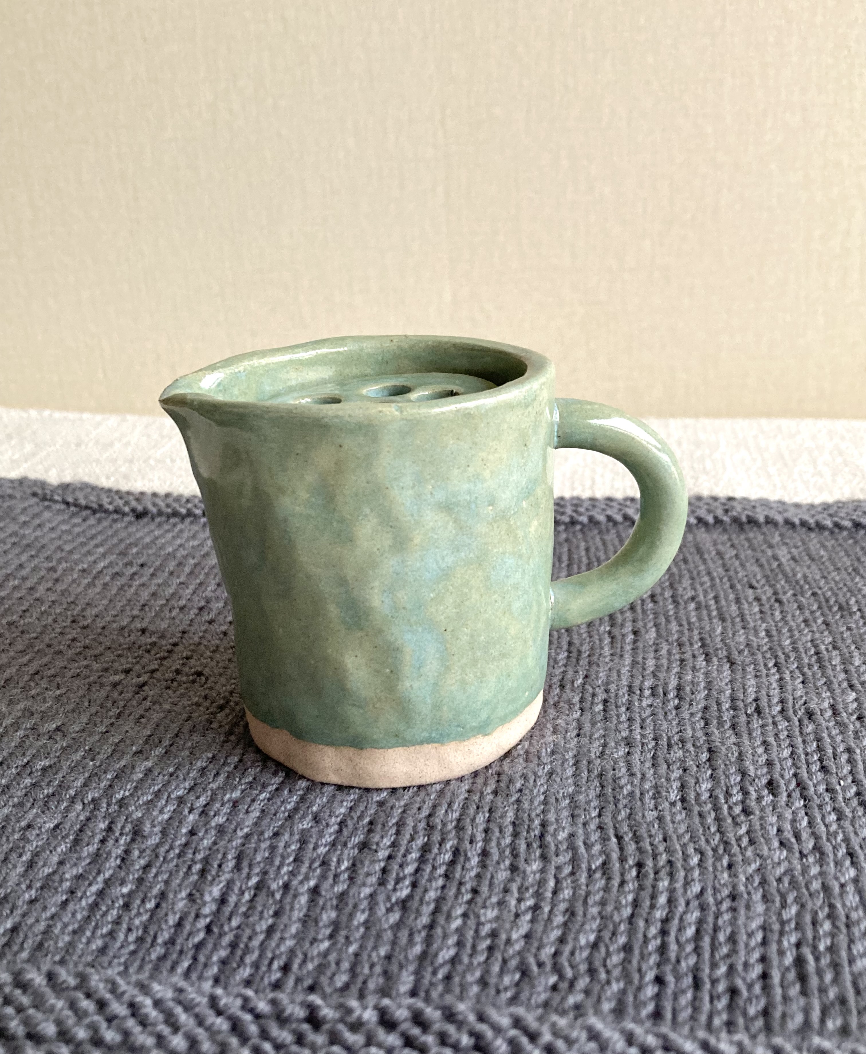 Small handmade flower bud jug vase