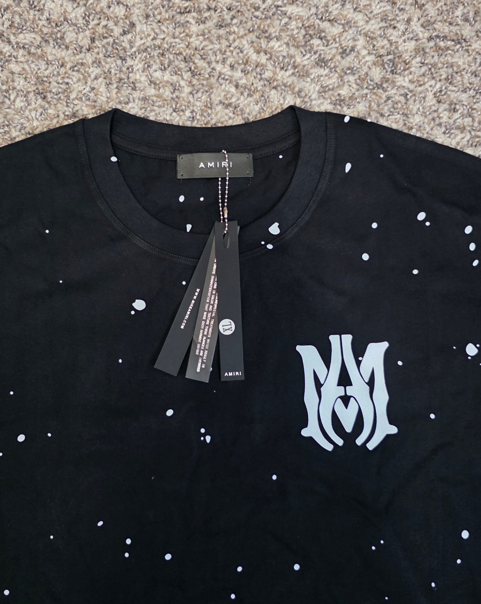 Camiseta AMIRI negra y blanca 