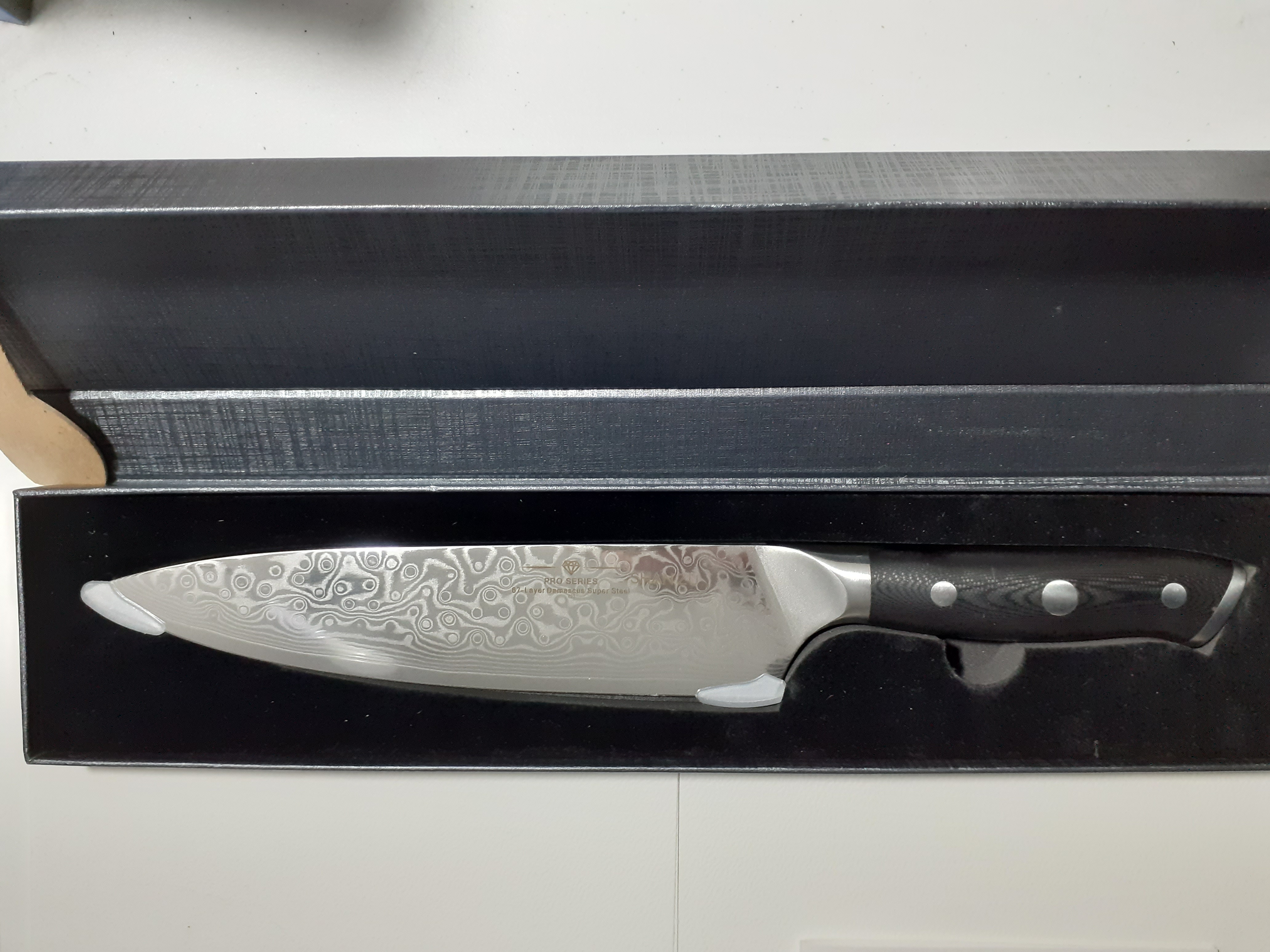 Couteau de Chef Damas Lame acier forgé Aus10 - 67 Feuilles  HRC:62