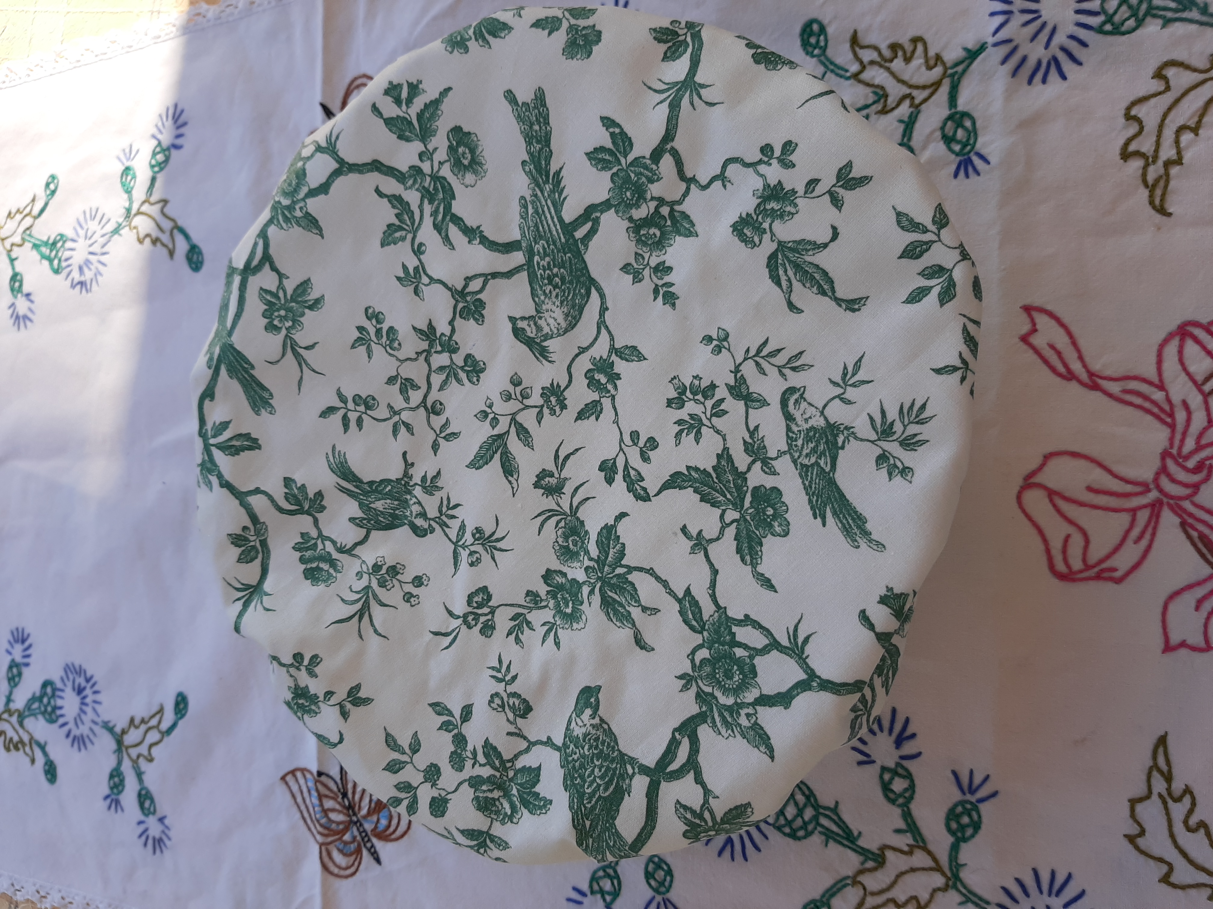 Couvre-plat en tissu enduit