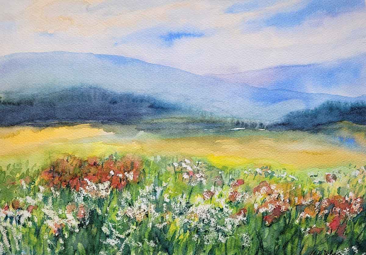 Sonnige Blumenwiese in weiter Landschaft  - Aquarell