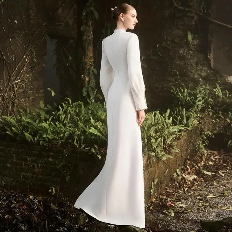 Elegant White Gown with Cape