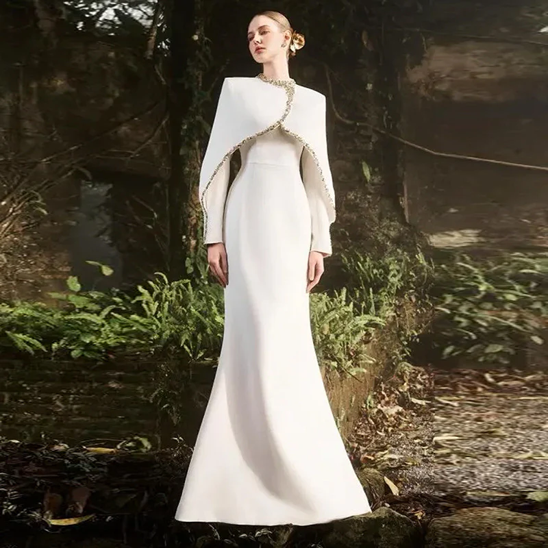 Elegant White Gown with Cape