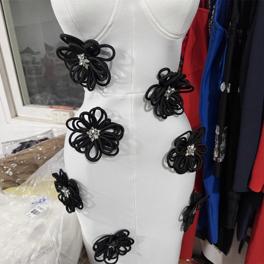 Elegant White Maxi Dress with Black Floral Appliqué