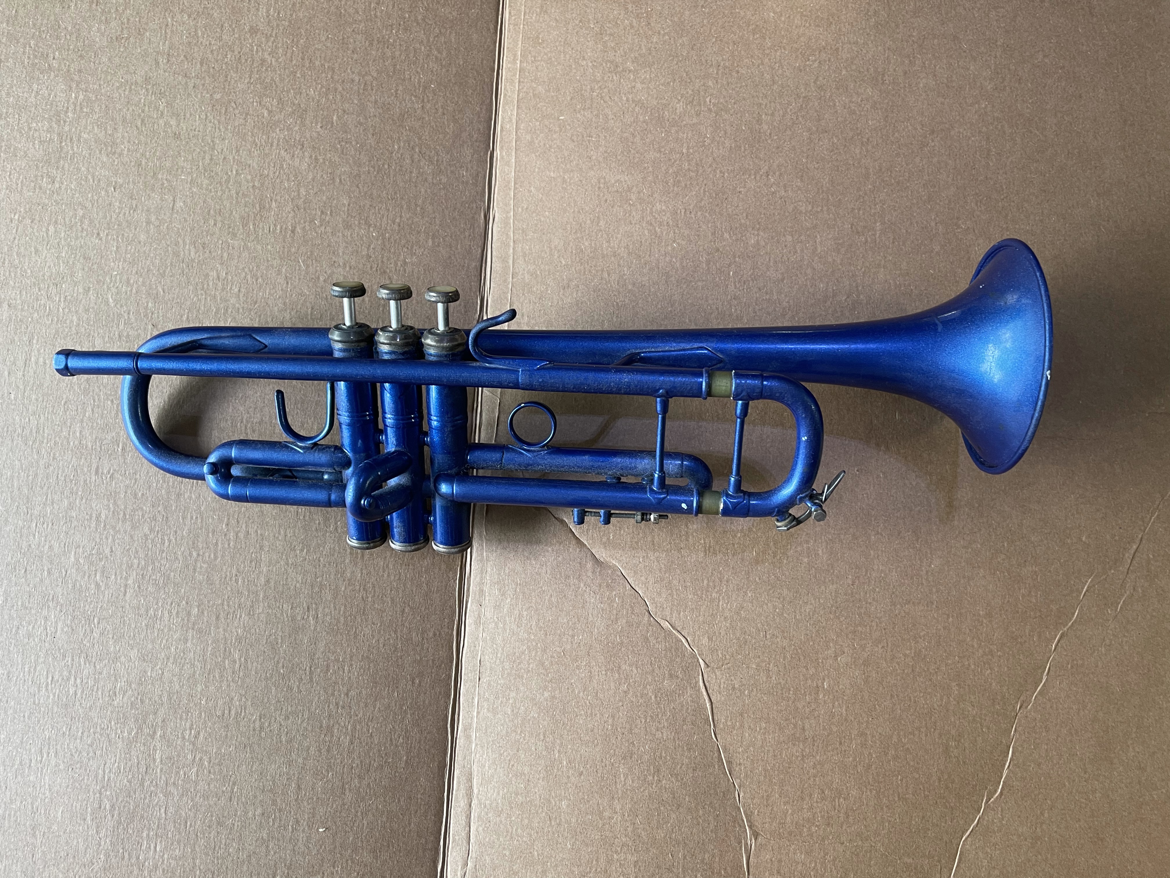 Brought back from the scrap heap: Bach Stradivarius Model 37 Krylon Painted Blue for a 4th of July parade