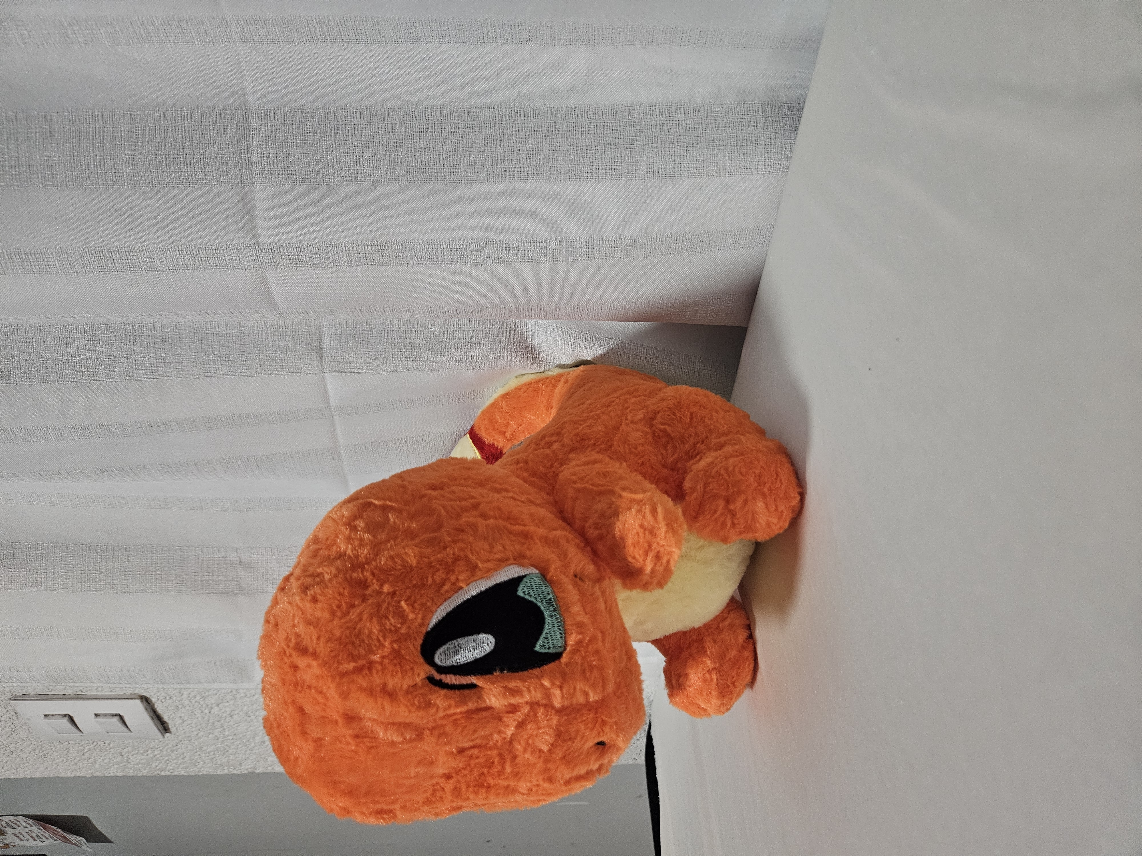 Peluche tipo Charmander