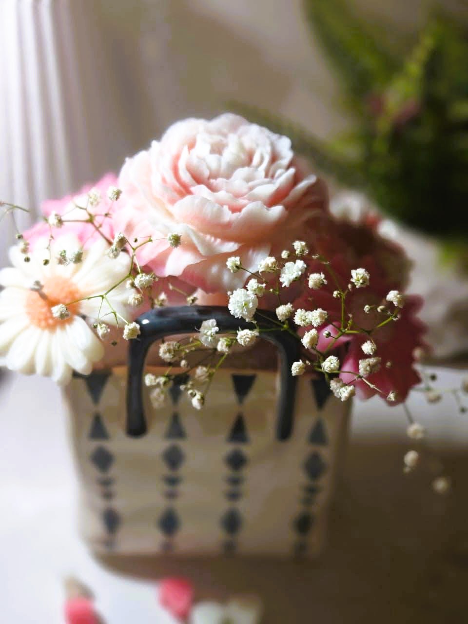 Blush Bloom Floral Arrangement( 7 flowers) in a Unique Ceramic Bag