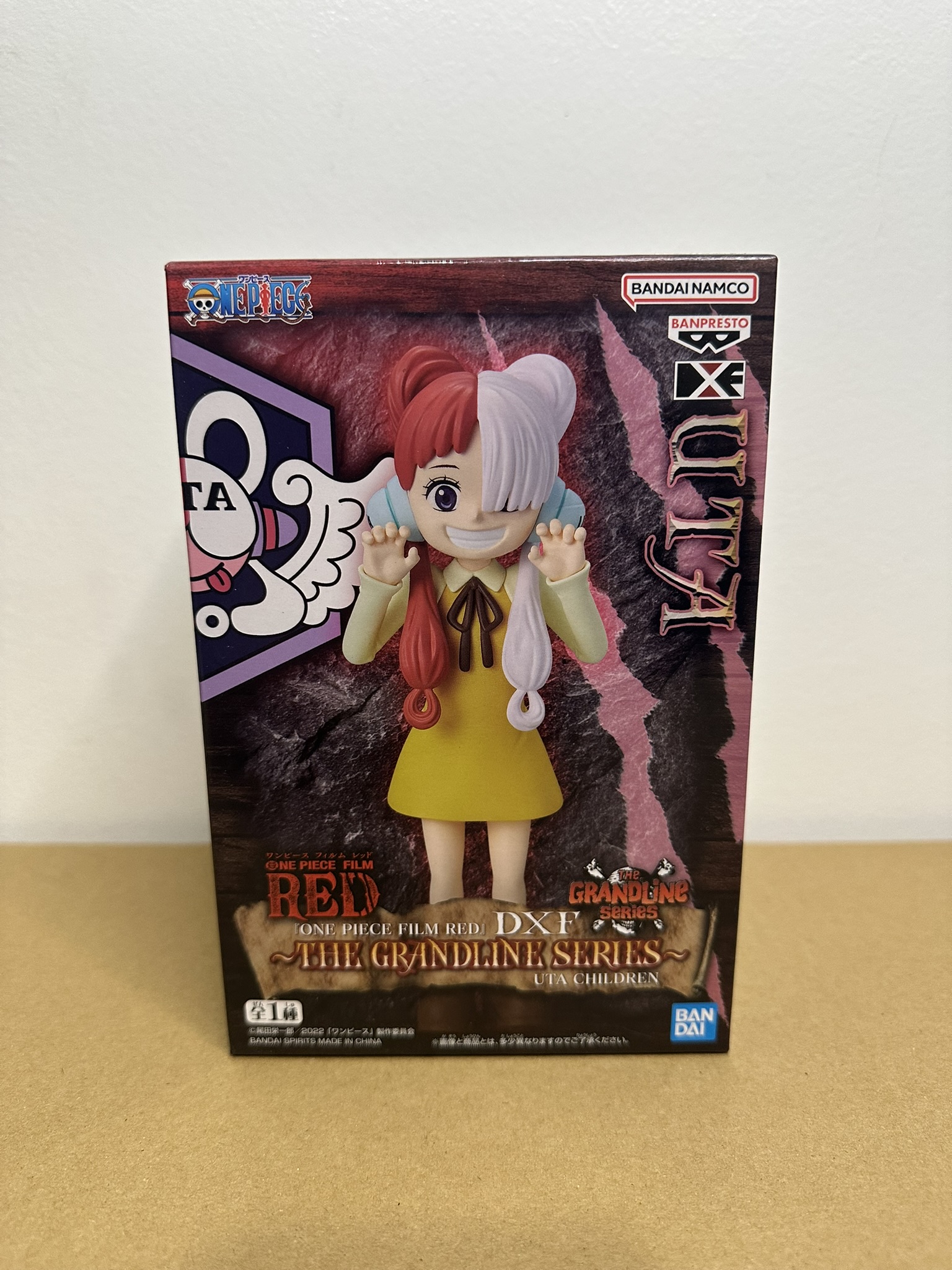 Figurine Uta en robe jaune RED
