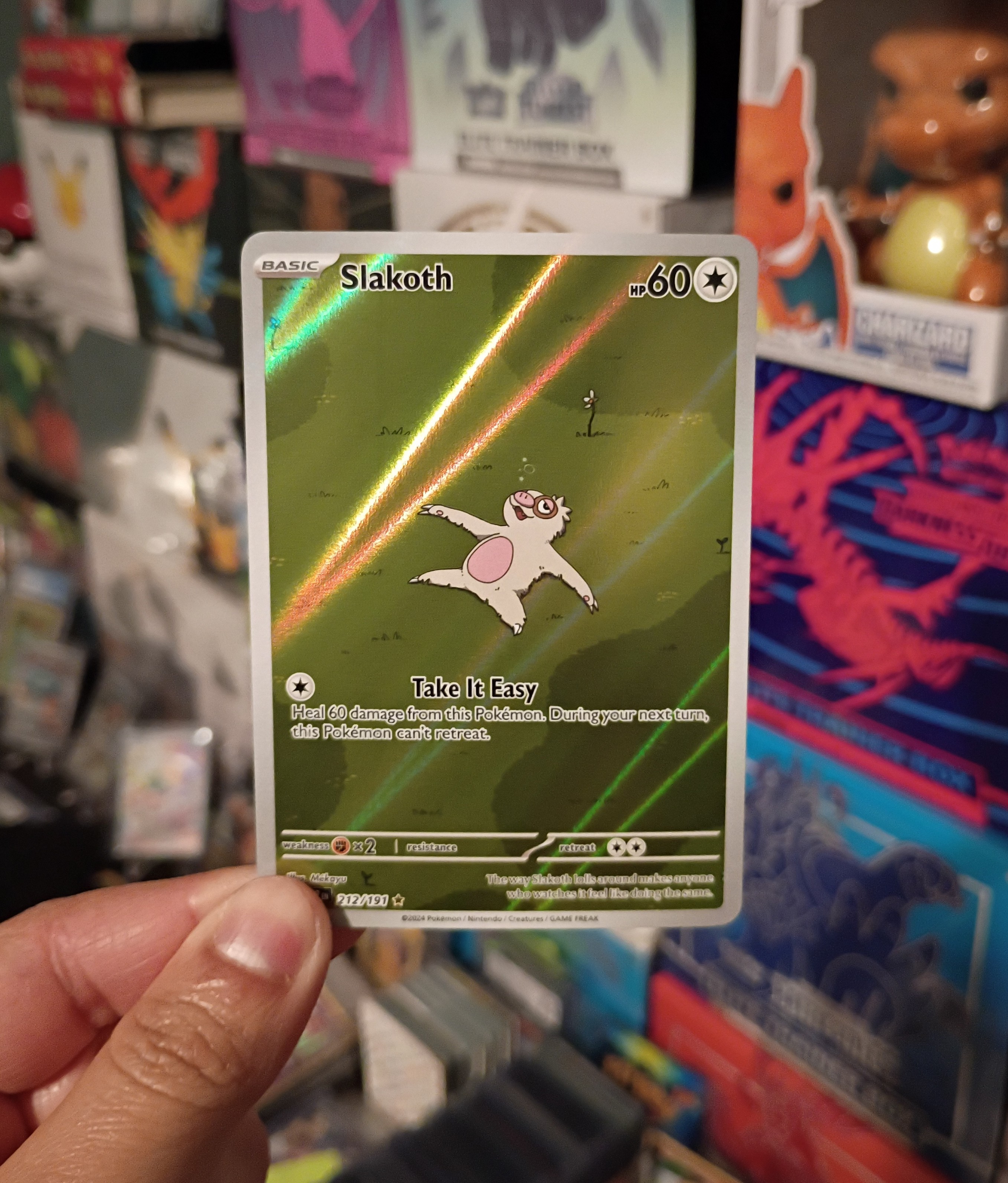 Pokemon Slakoth 212/191 Sv08: Surging Sparks Holo