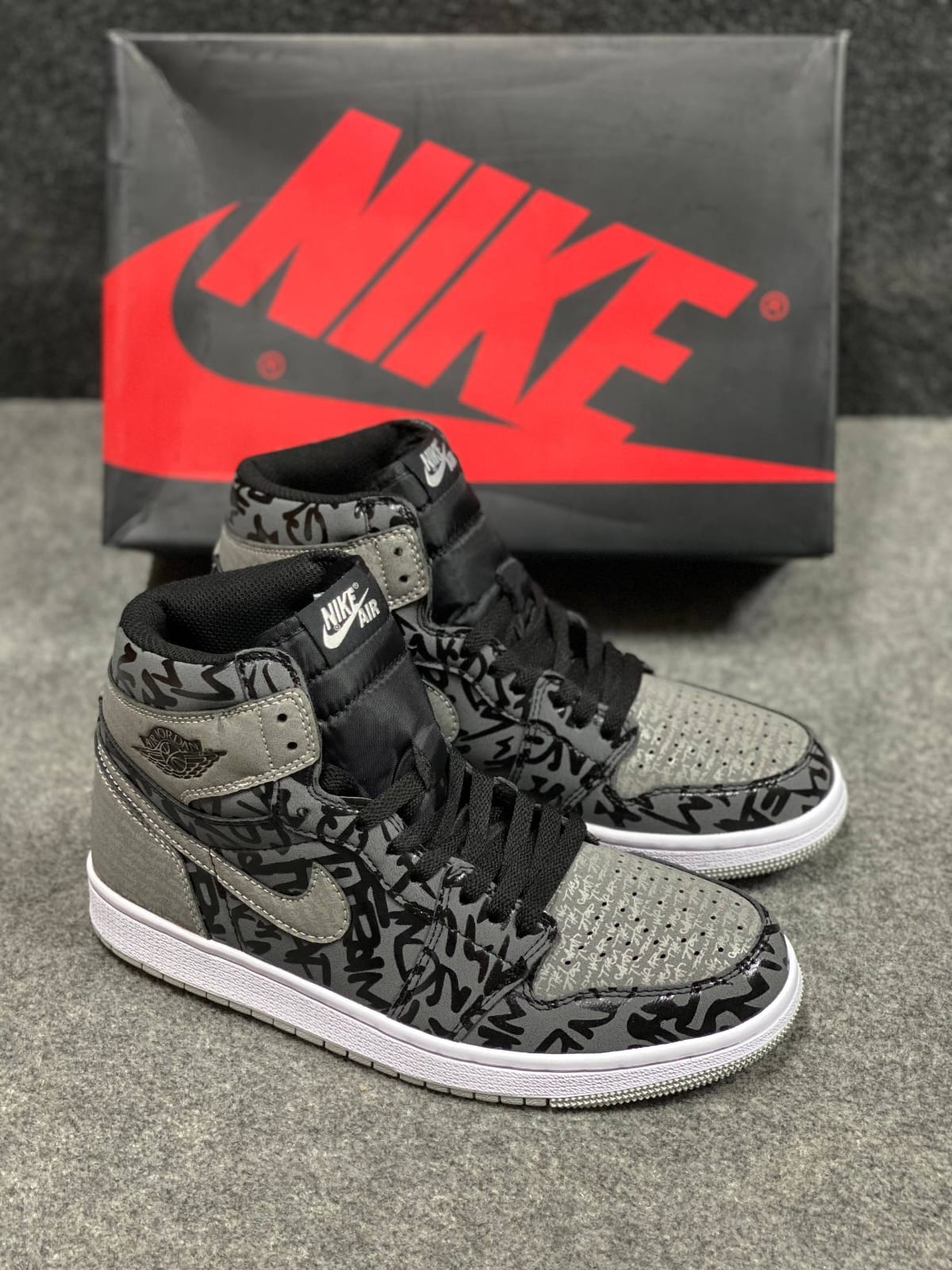 Nike Air Jordan 1 Retro High OG "Rebellionaire". 