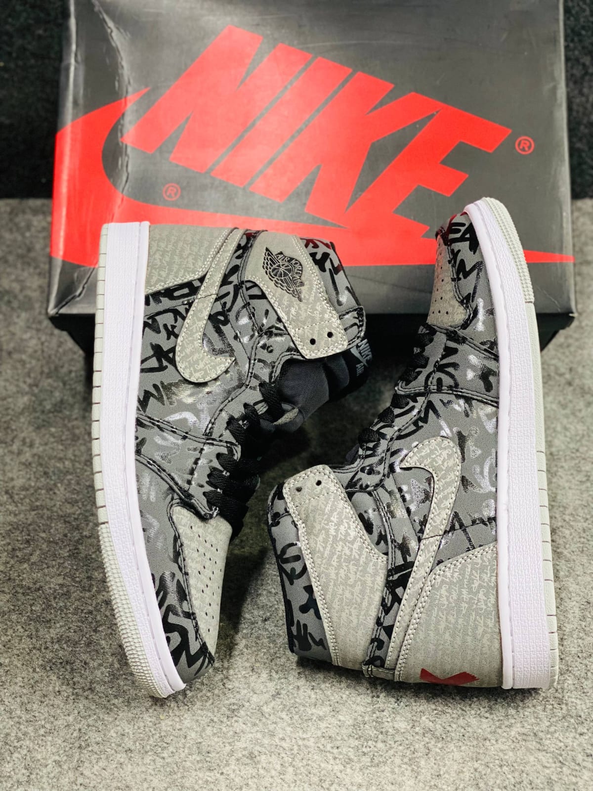 Nike Air Jordan 1 Retro High OG "Rebellionaire". 