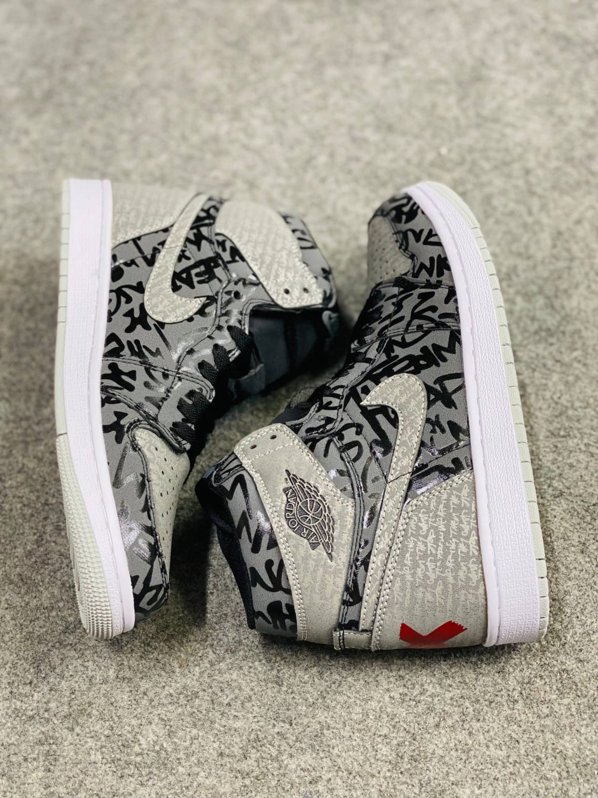 Nike Air Jordan 1 Retro High OG "Rebellionaire". 