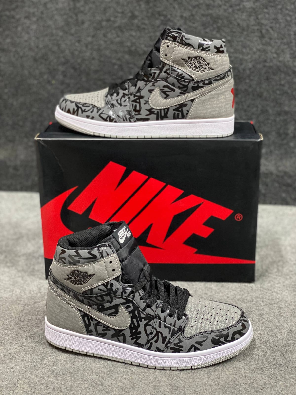 Nike Air Jordan 1 Retro High OG "Rebellionaire". 