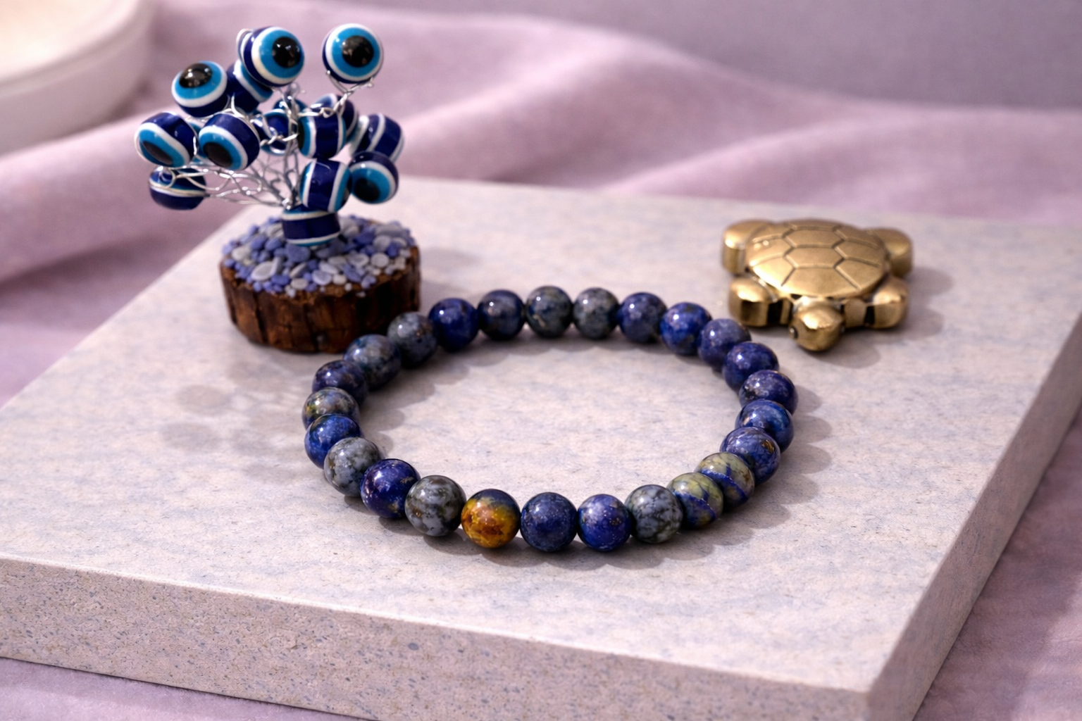 Lapis Lazuli Clarity Bracelet with Evil Eye Plant & Pyrite Tortoise | Certificate of Authenticity of Bracelet also included |