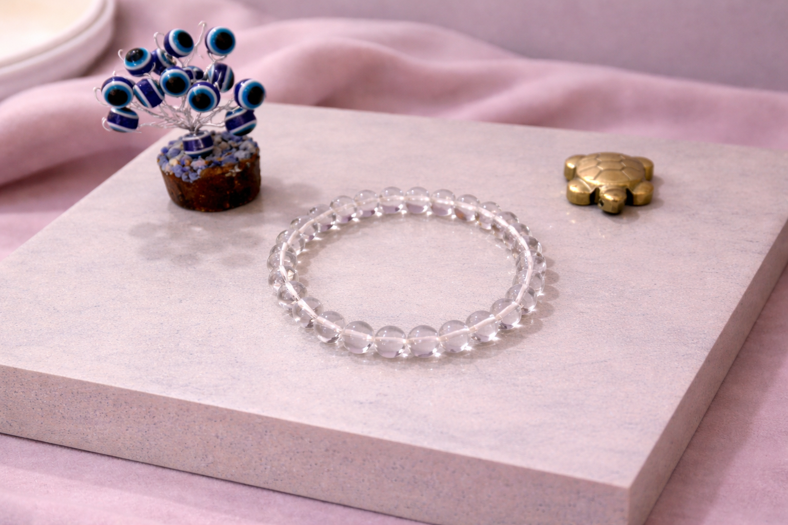 Clear Quartz Focus Bracelet with Evil Eye Plant & Pyrite Tortoise | Certificate of Authenticity of Bracelet also included |