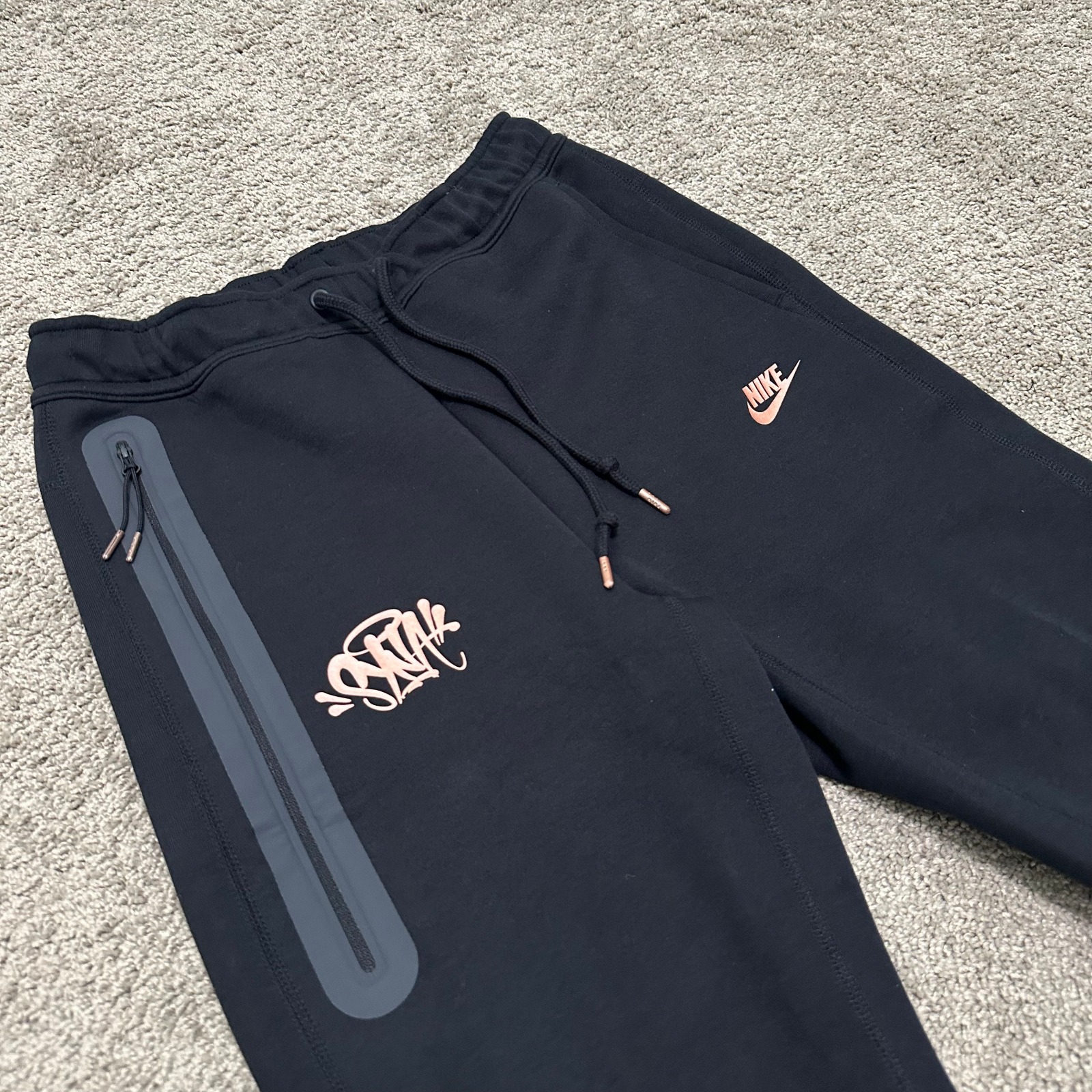 conjunto nike teck fleece x syna world