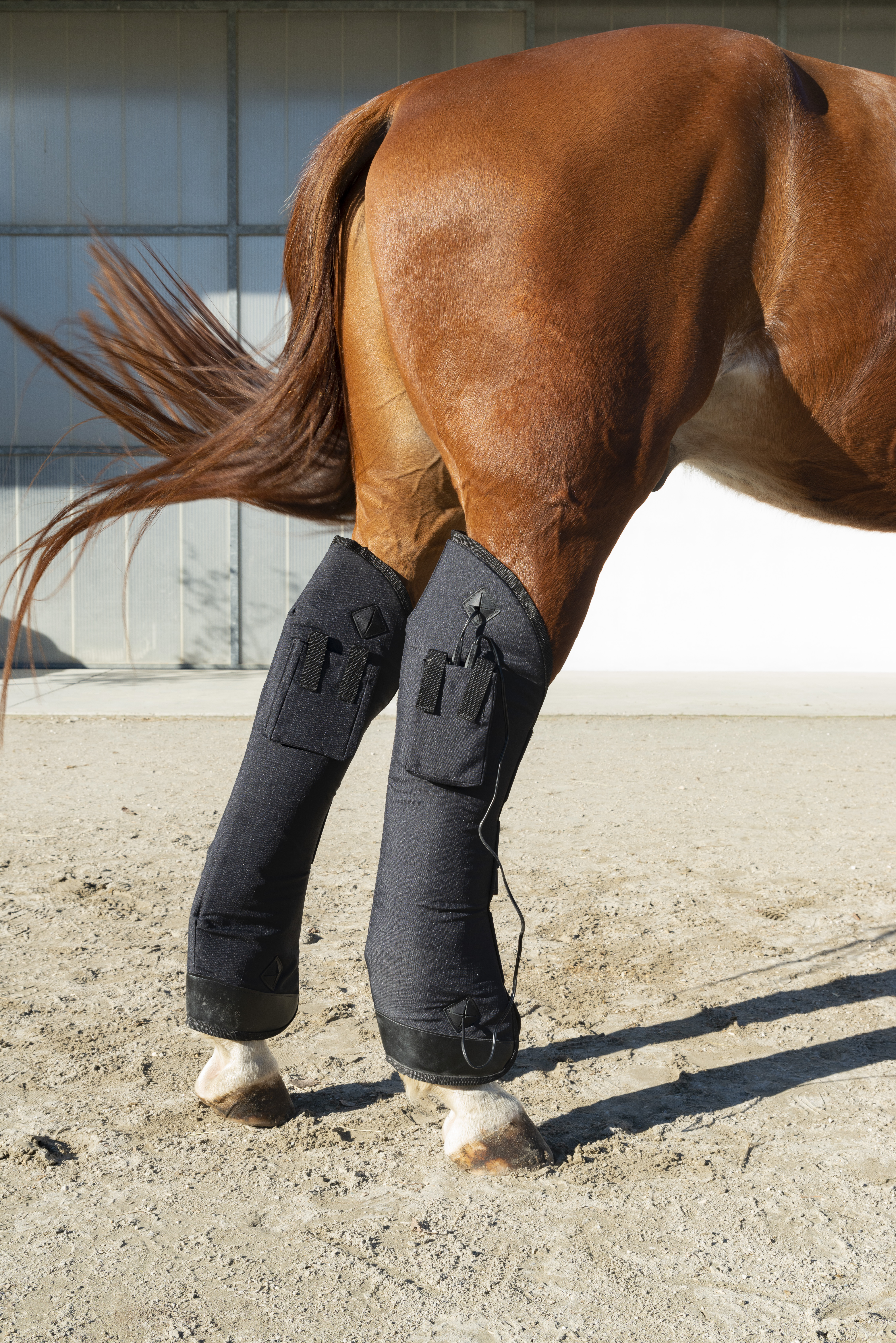 therapeutic back boot with solenoids