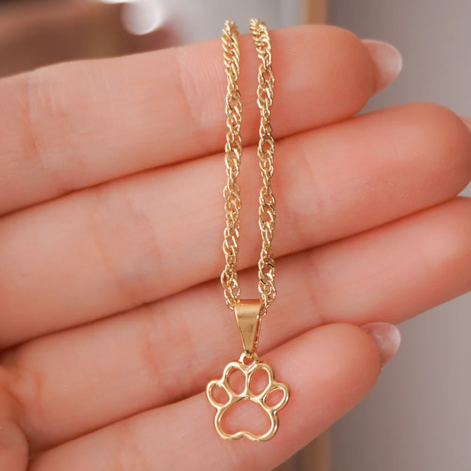 Collar con dije huella dorada