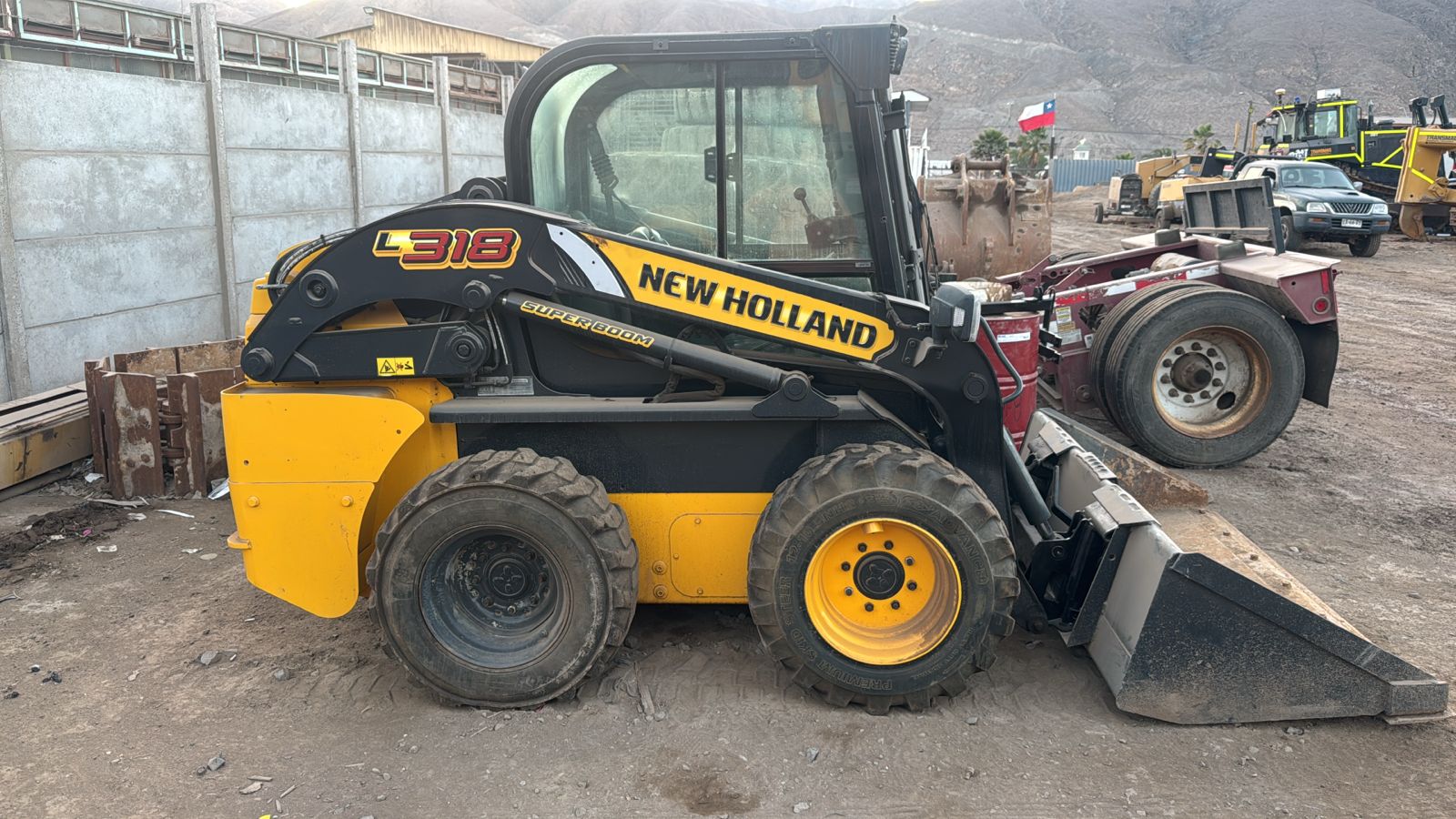 Mini Cargador NEW HOLLAND L318