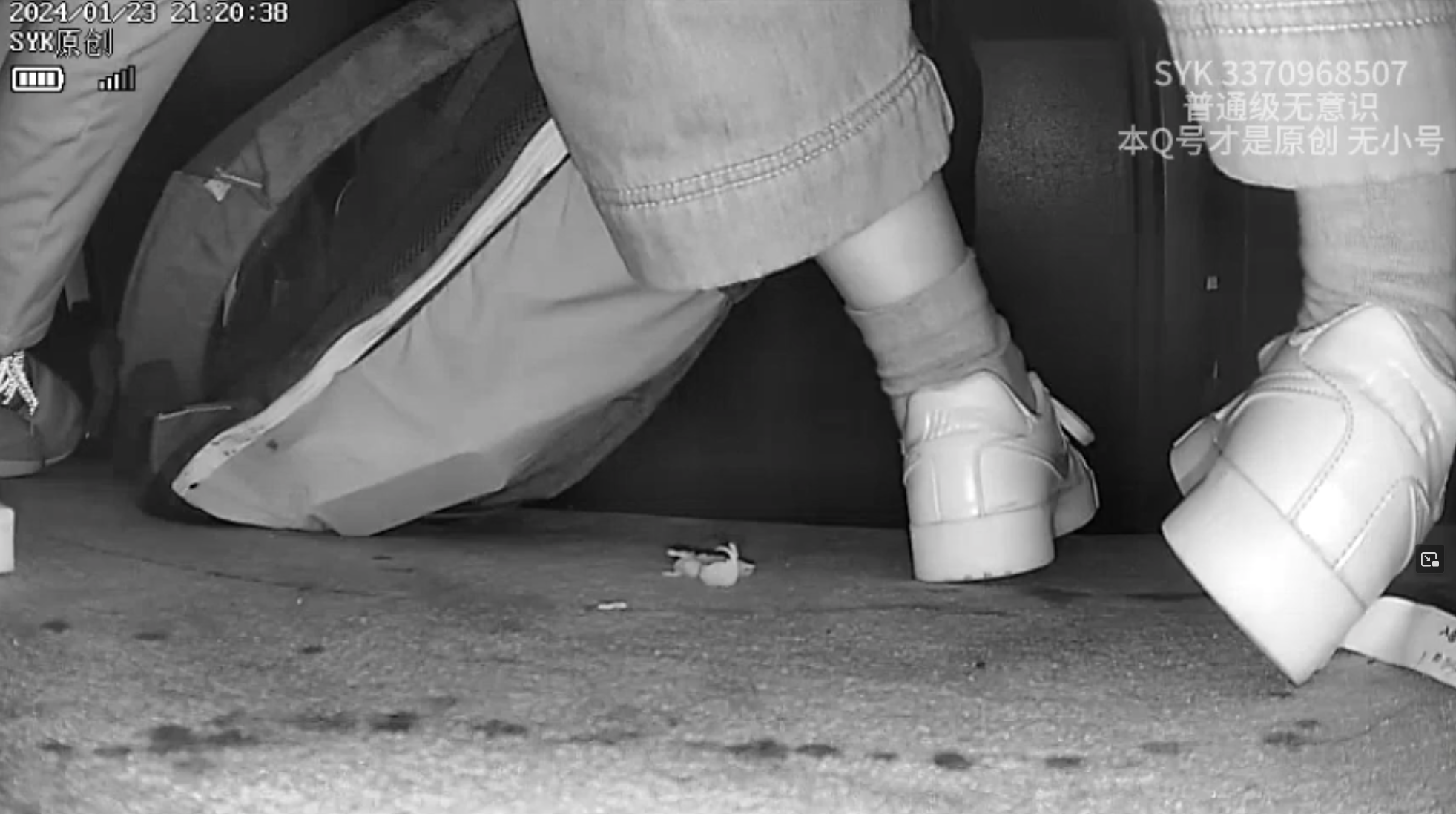 Pinkie crush by young woman wearing  Sneakers and boots