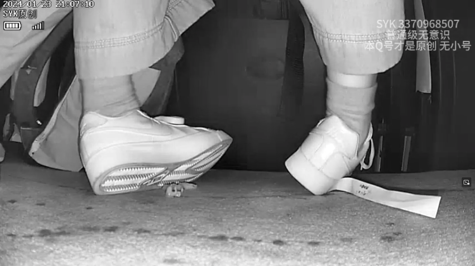 Pinkie crush by young woman wearing  Sneakers and boots