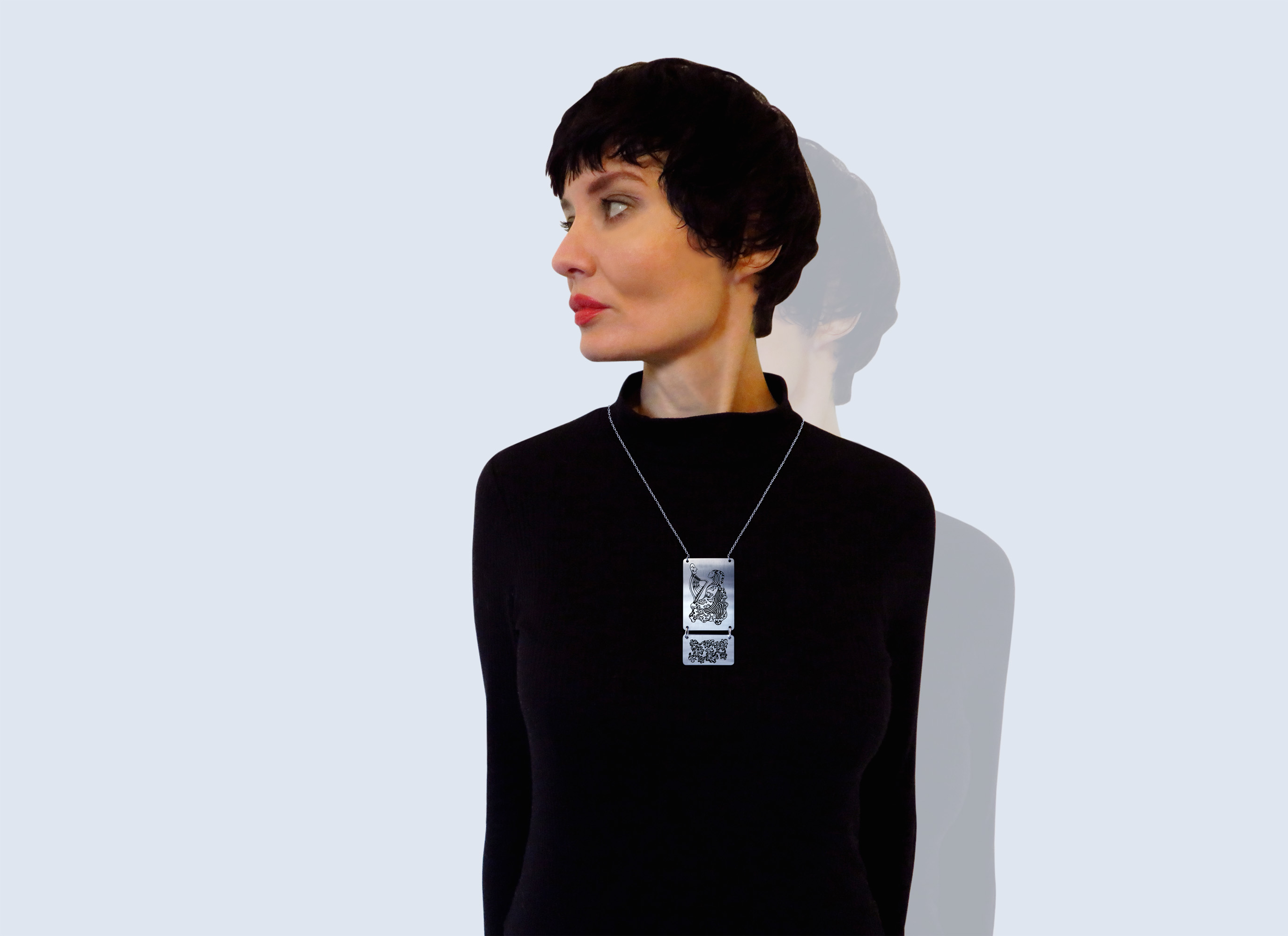 Engraved necklace HARPIST in black 