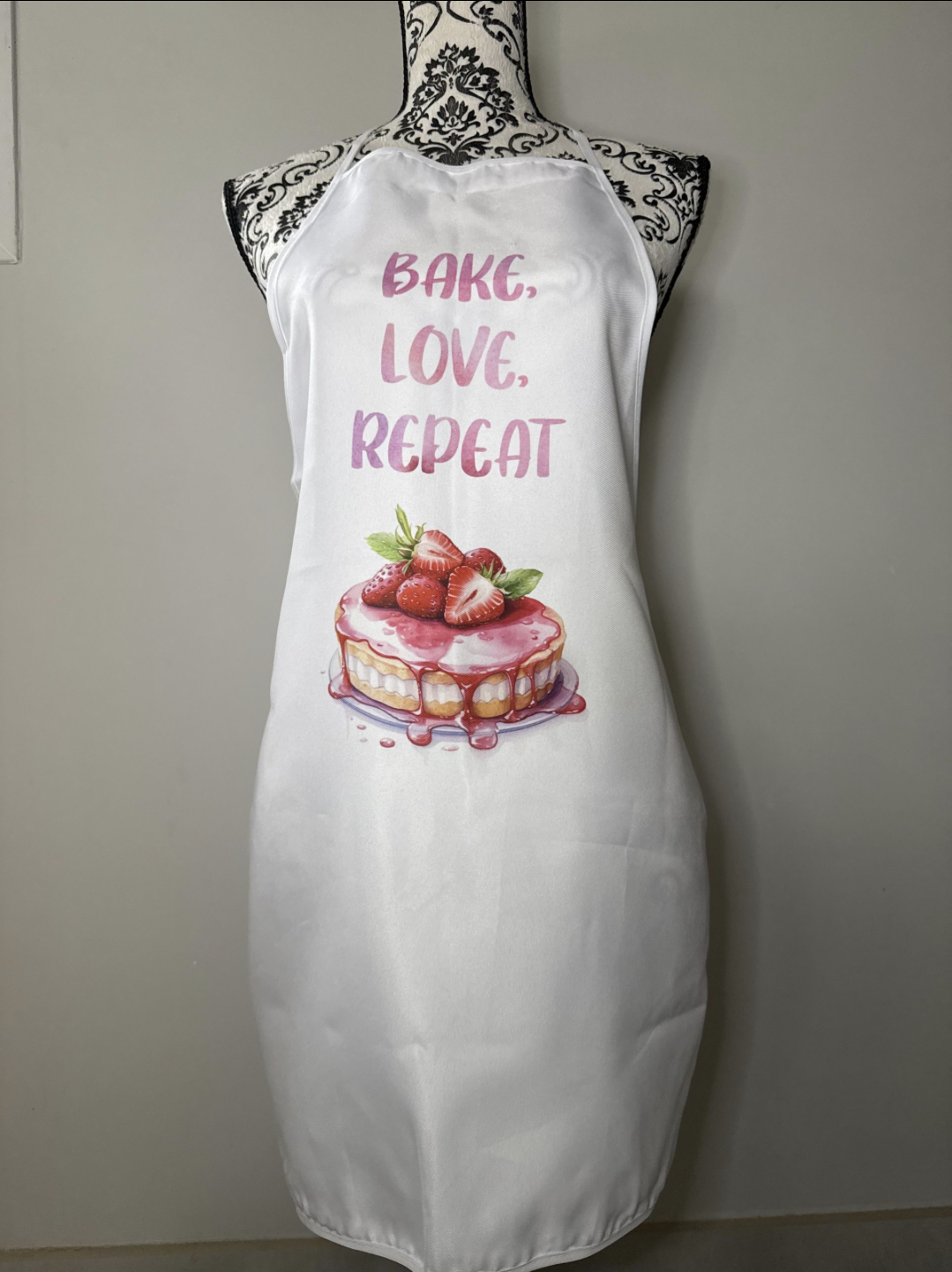 Tablier de cuisine "Bake Love Repeat"