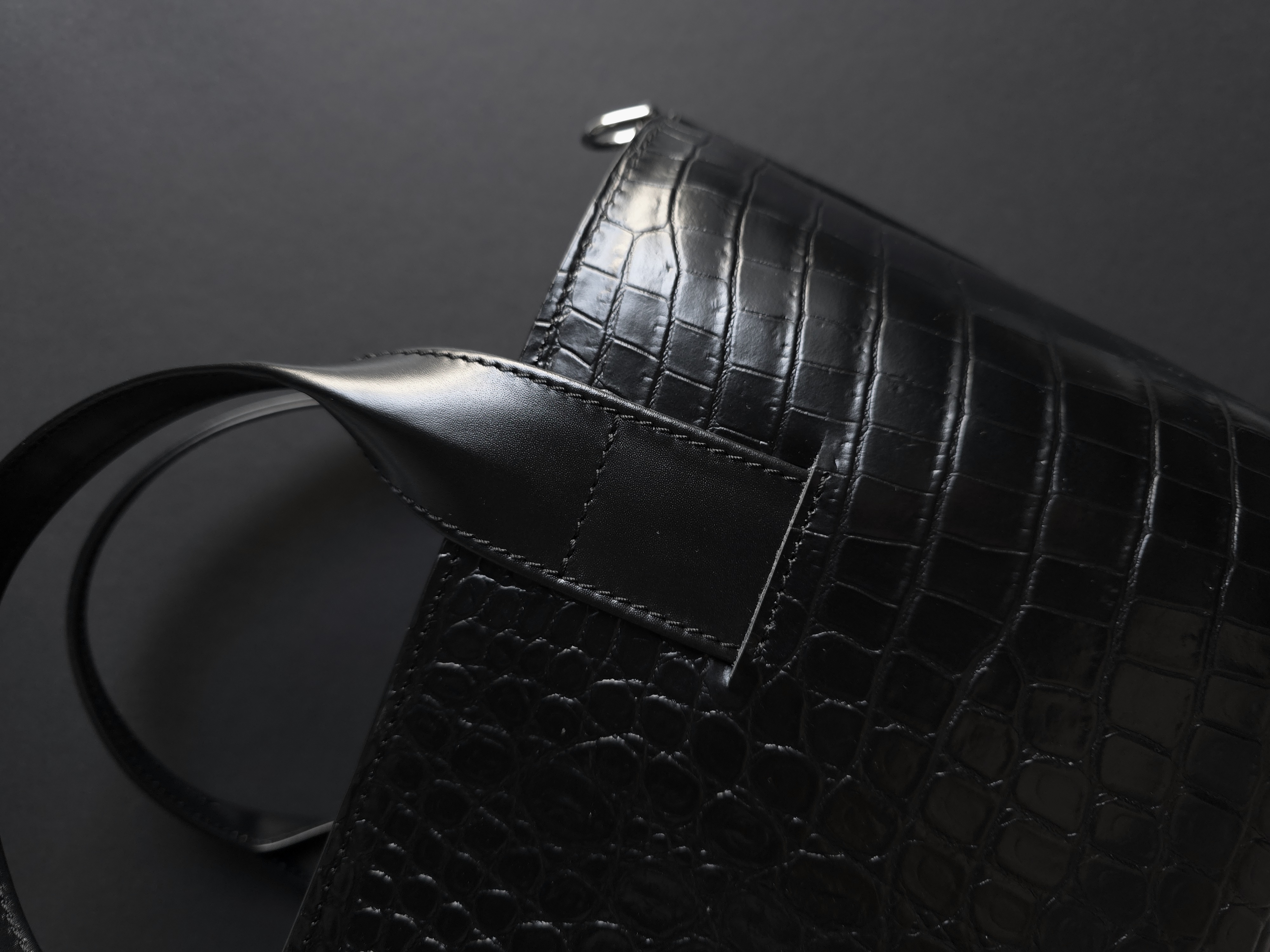 Croco print top handle leather bag