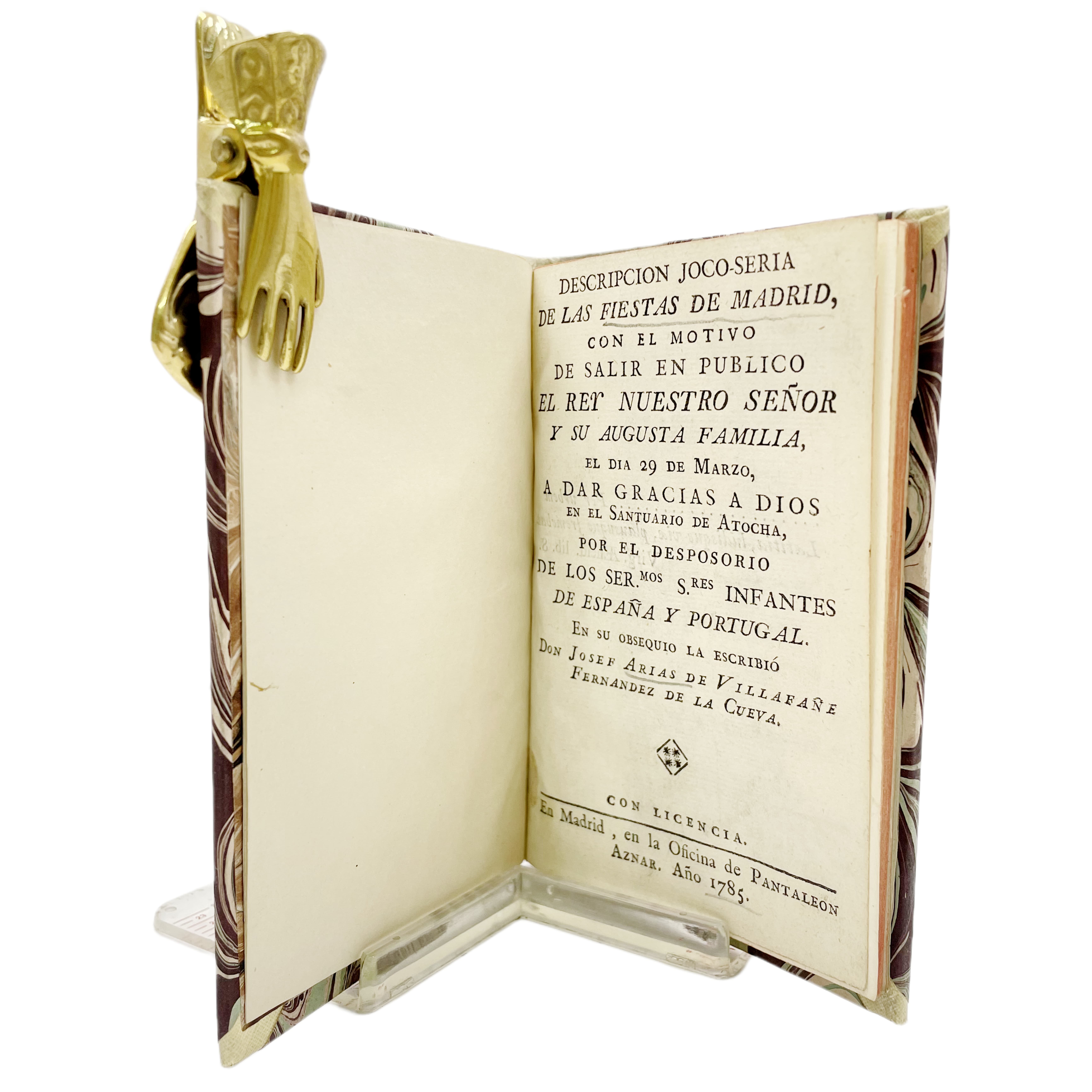 DESCRIPCIÓN JOCO-SERIA DE LAS FIESTAS DE MADRID CON MOTIVO DE SALIR EN PUBLICO EL REY NUESTRO SEÑOR Y SU AUGUSTA FAMILIA EL DIA 29 DE MARZO A DAR GRACIA A DIOS EN EL SANTUARIO DE ATOCHA POR EL DESPOSORIO DE LOS SER.MOS S.RES INFANTES DE ESPAÑA Y PORT