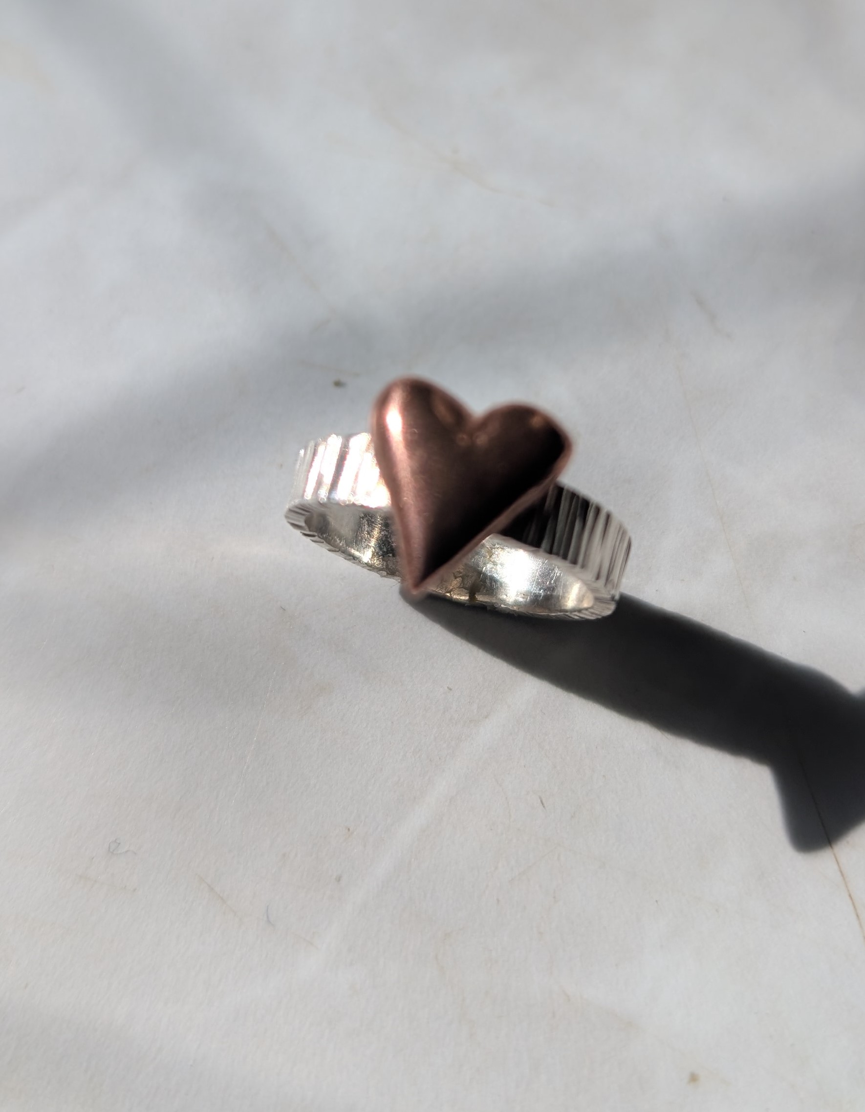 Sterling silver ring with chunky copper puff heart, size L