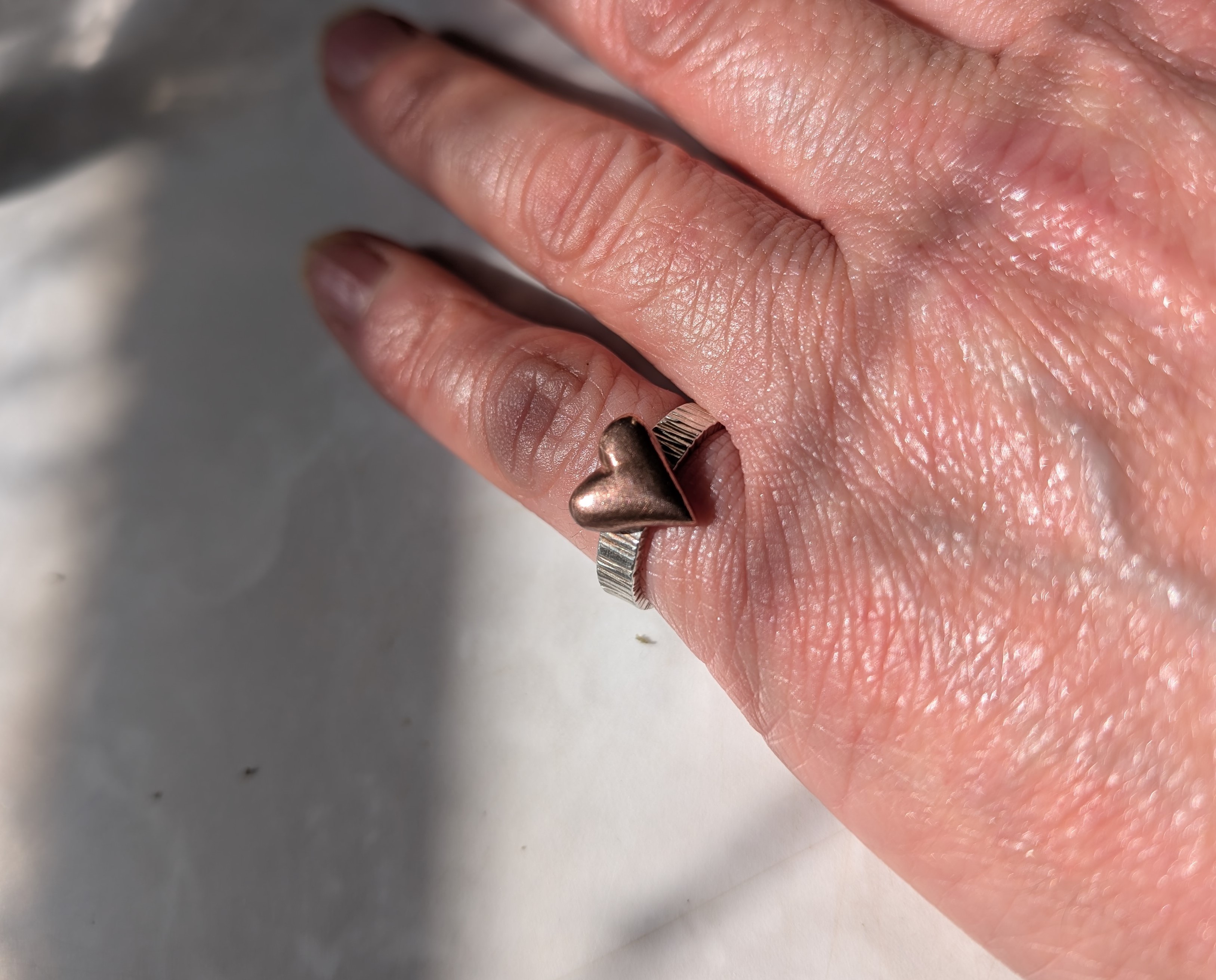 Sterling silver ring with chunky copper puff heart, size L