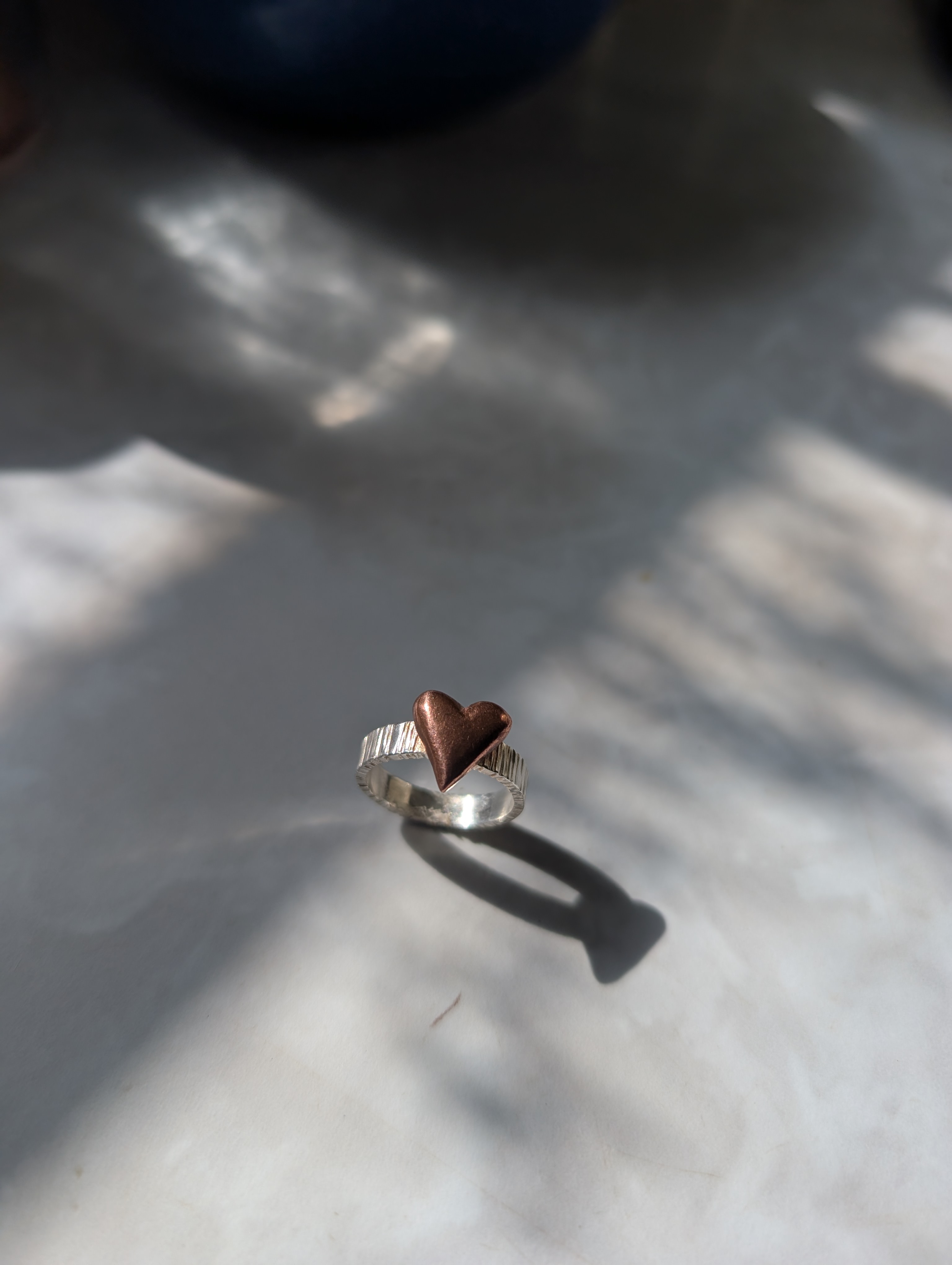 Sterling silver ring with chunky copper puff heart, size L