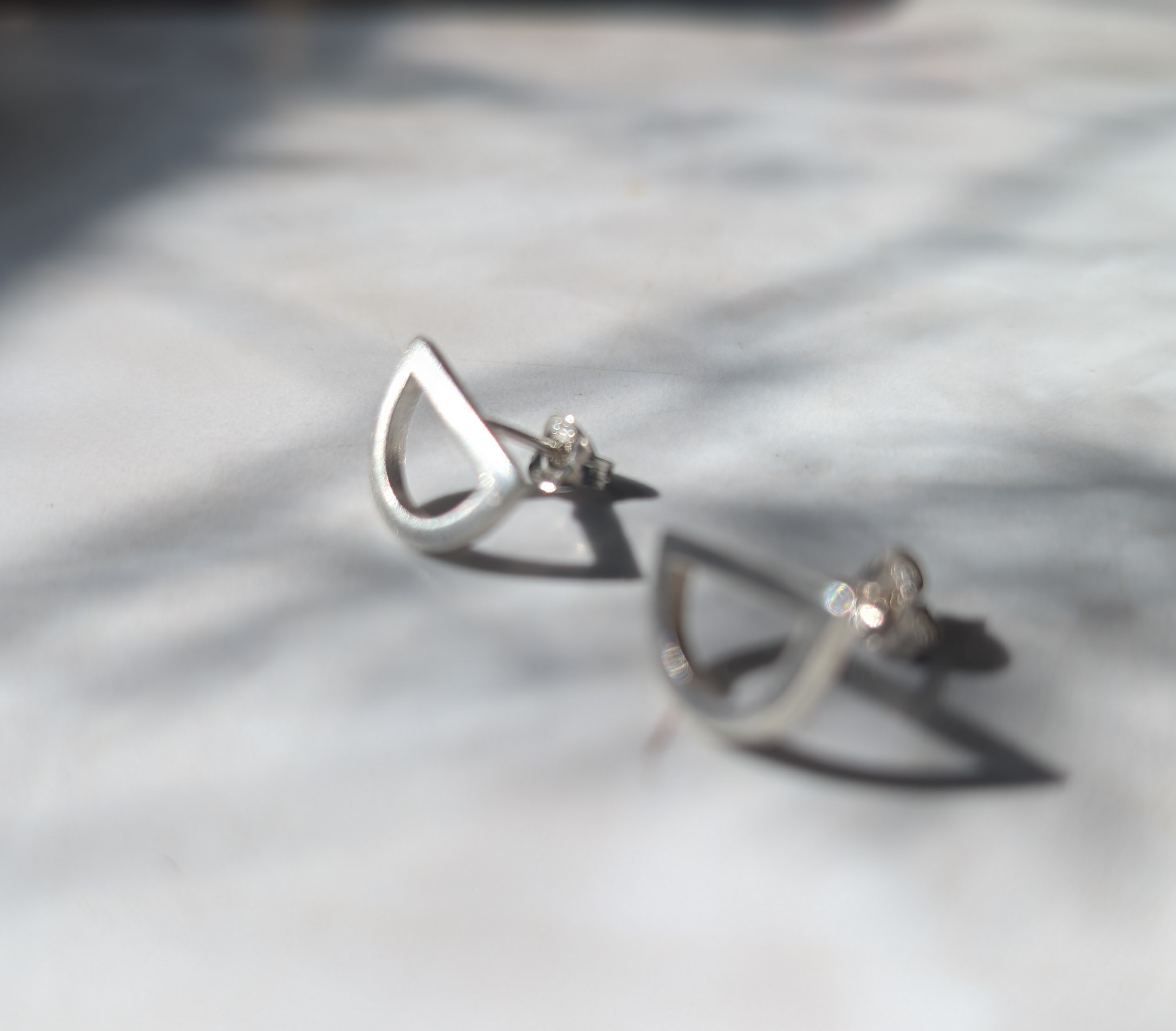 Geometric Sterling Silver studs made using recycled silver.