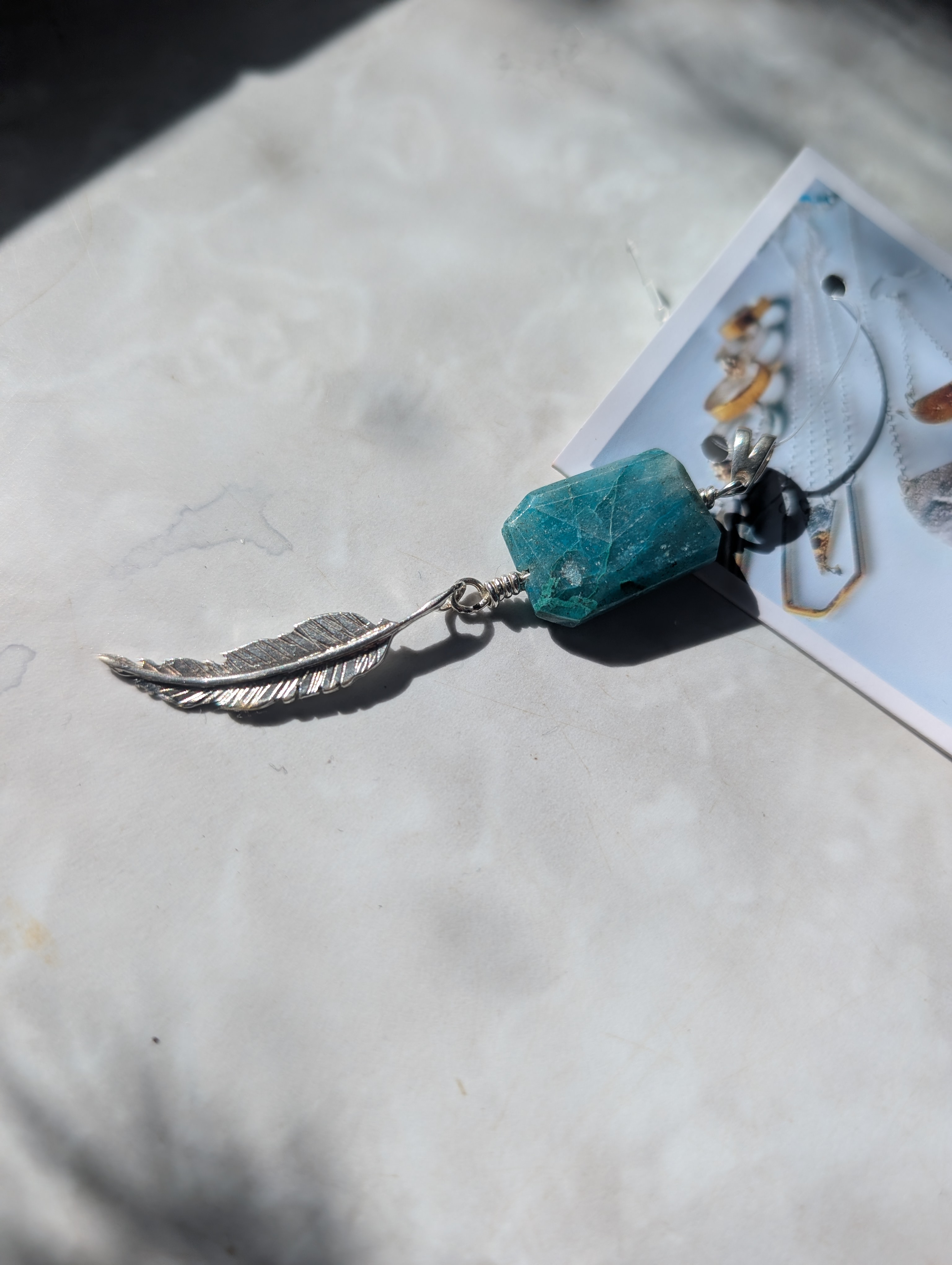Pendant with Apatite gemstone, with sterling silver feather