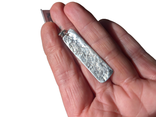Sterling silver pendant, hand stamped design and oxidised.