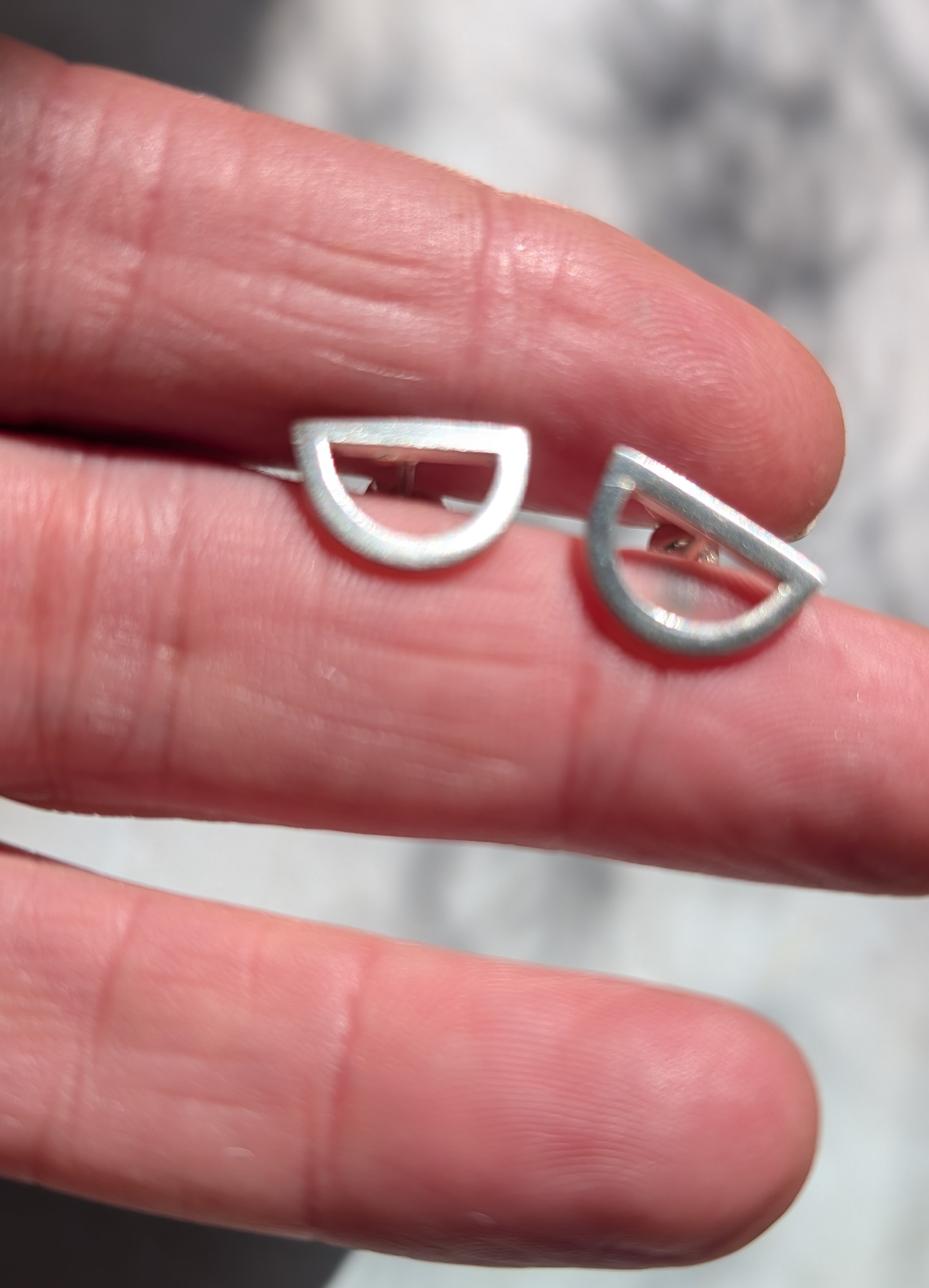 Geometric Sterling Silver studs made using recycled silver.