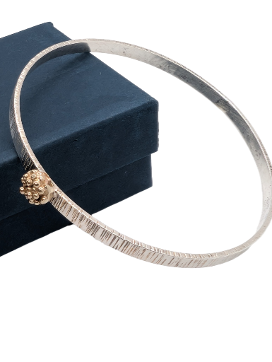 Sterling silver bangle with 9ct gold bauble