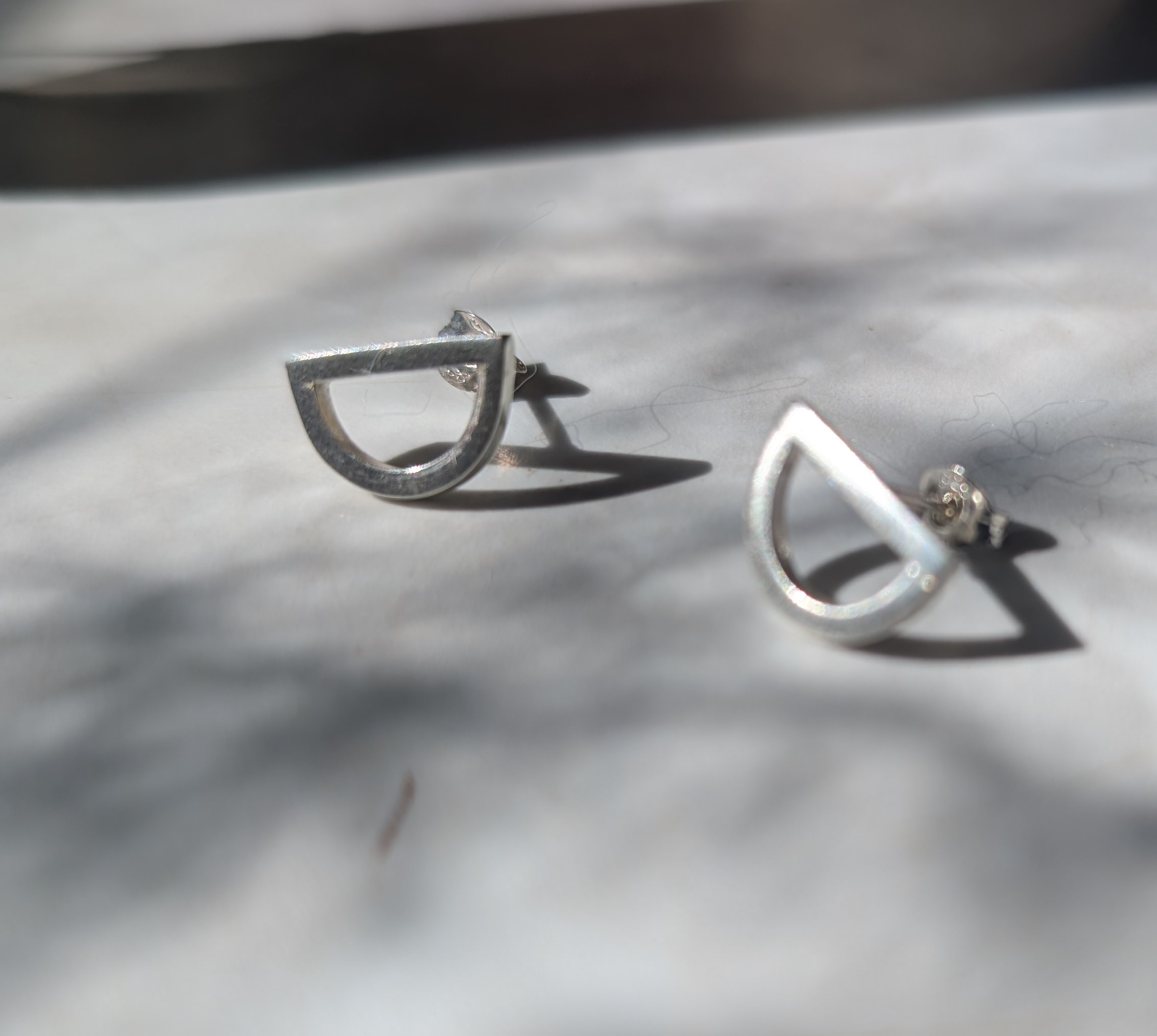 Geometric Sterling Silver studs made using recycled silver.