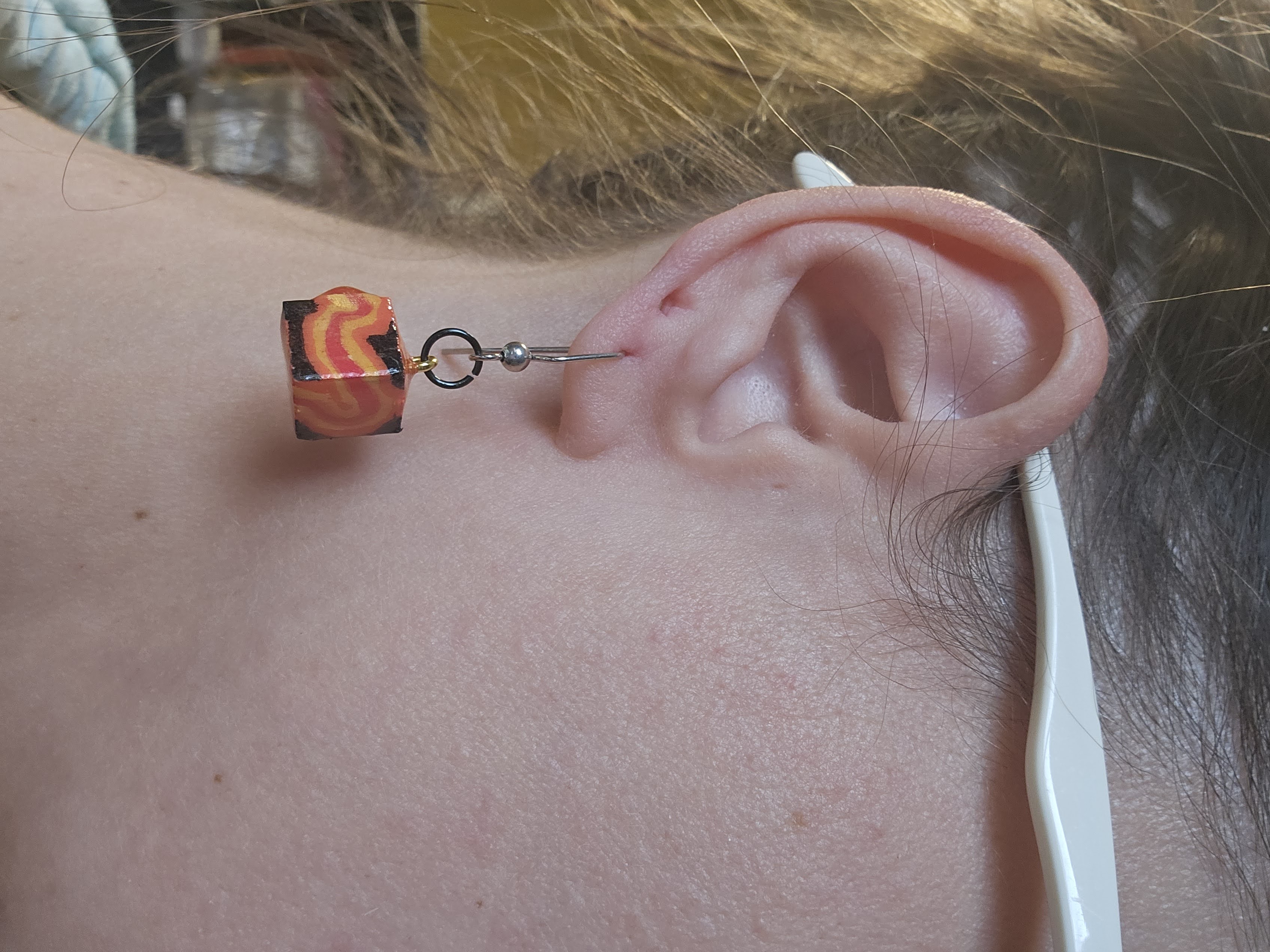 Handrawn Wooden Art Earrings coated in resin