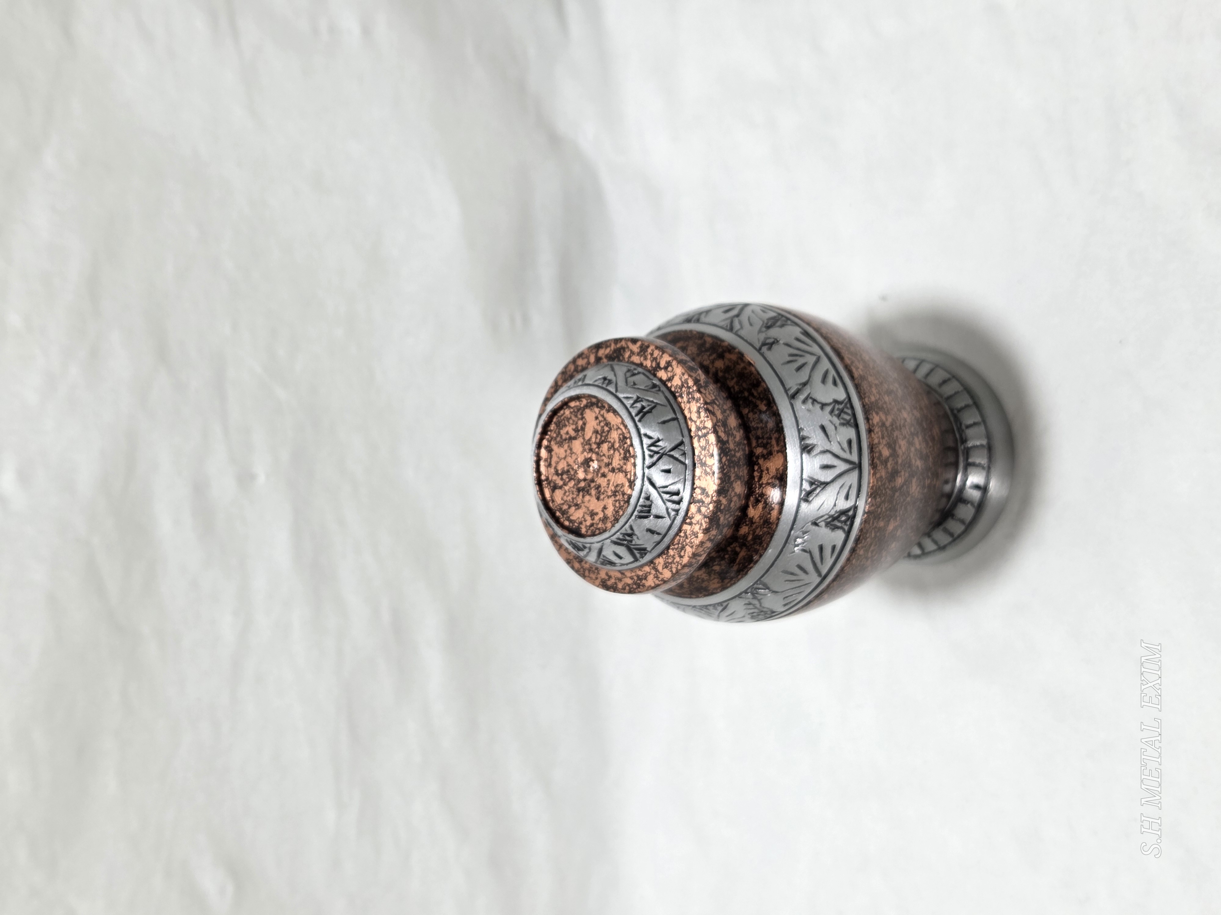 Elegance in Memory: The Copper Patina Urn