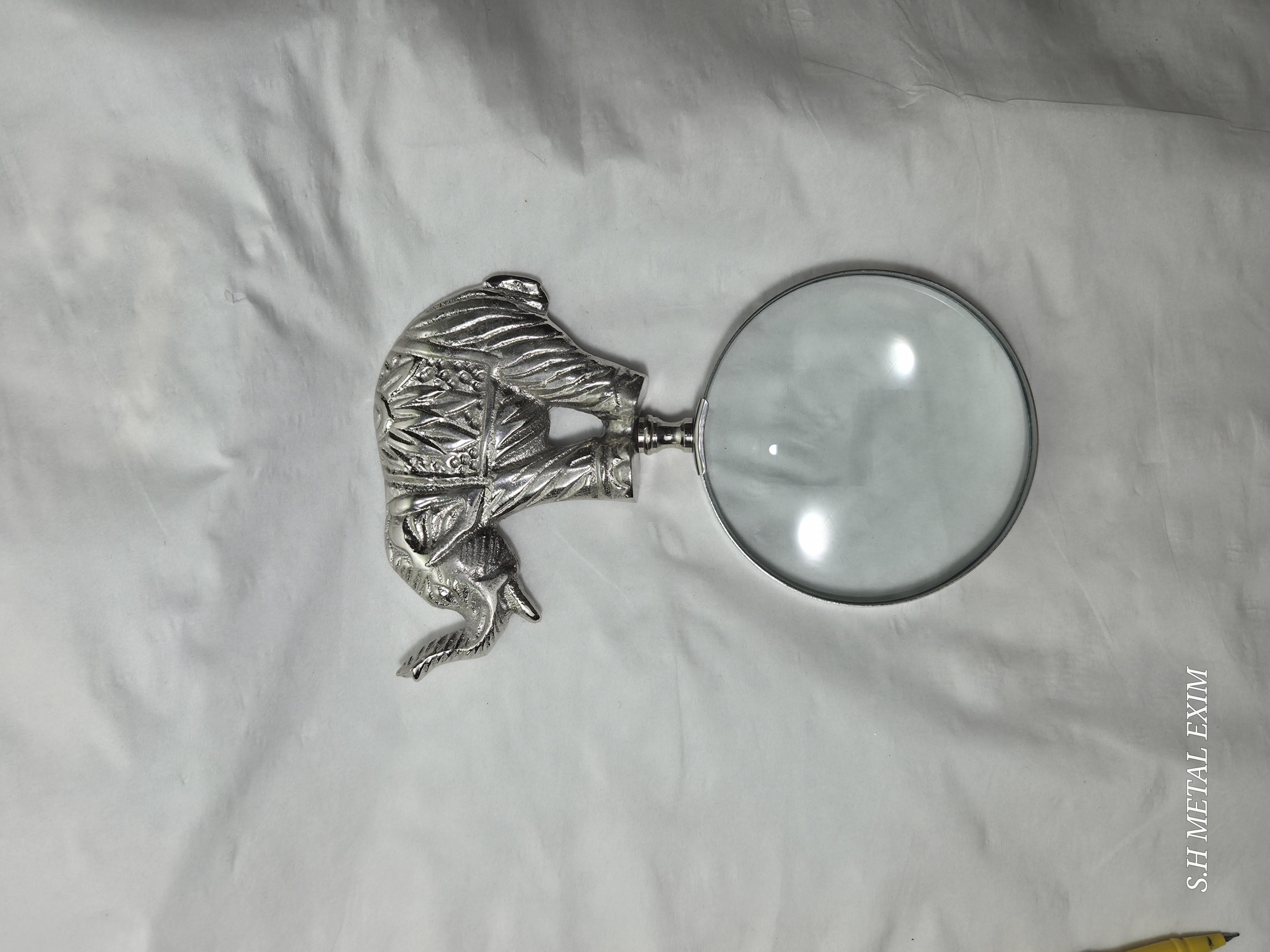 Navigating Legend: The Scholar’s Gilded Atlas and Elephant Magnifier