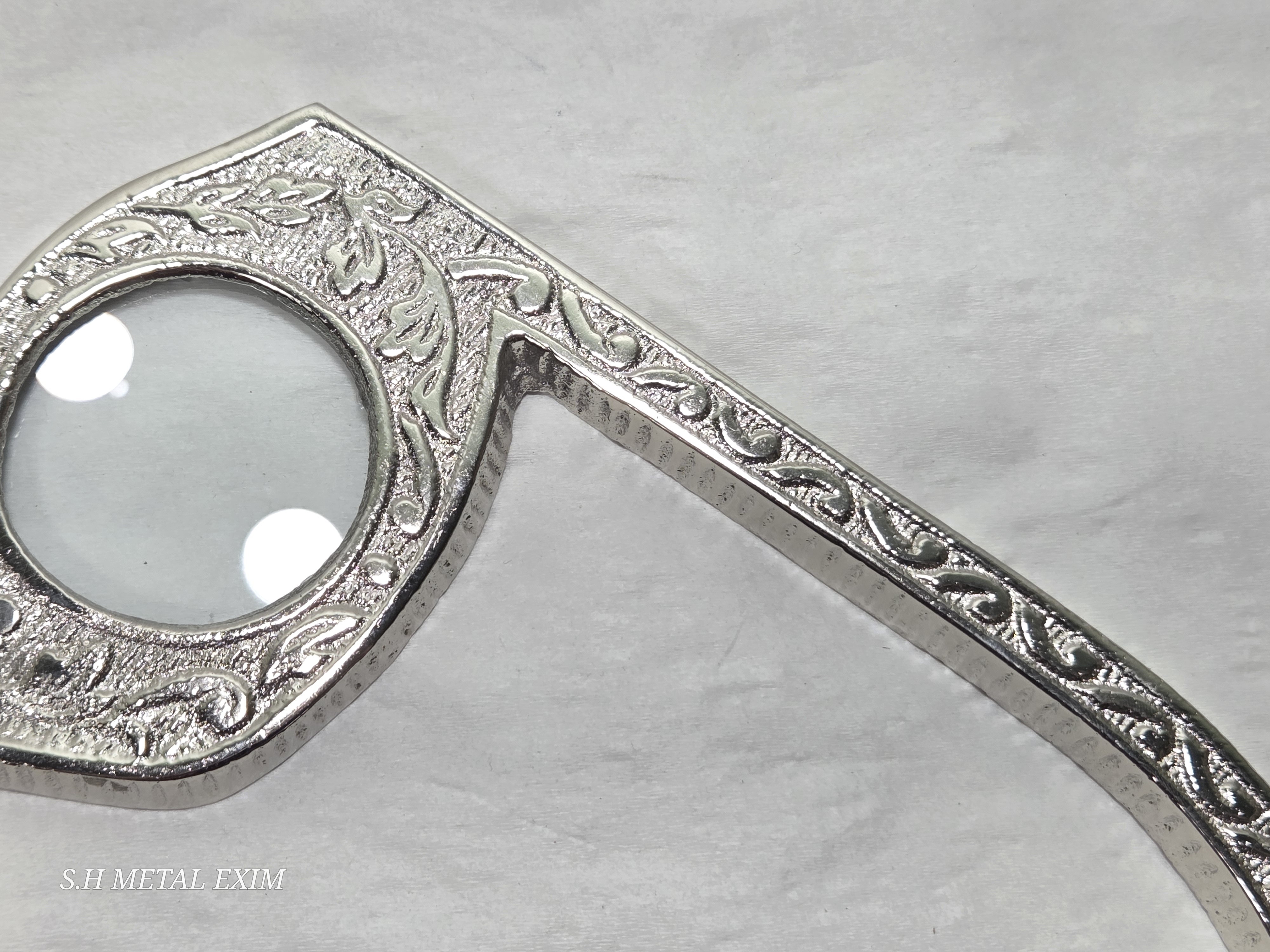 Ornate Silver Handheld Magnifying Glass
