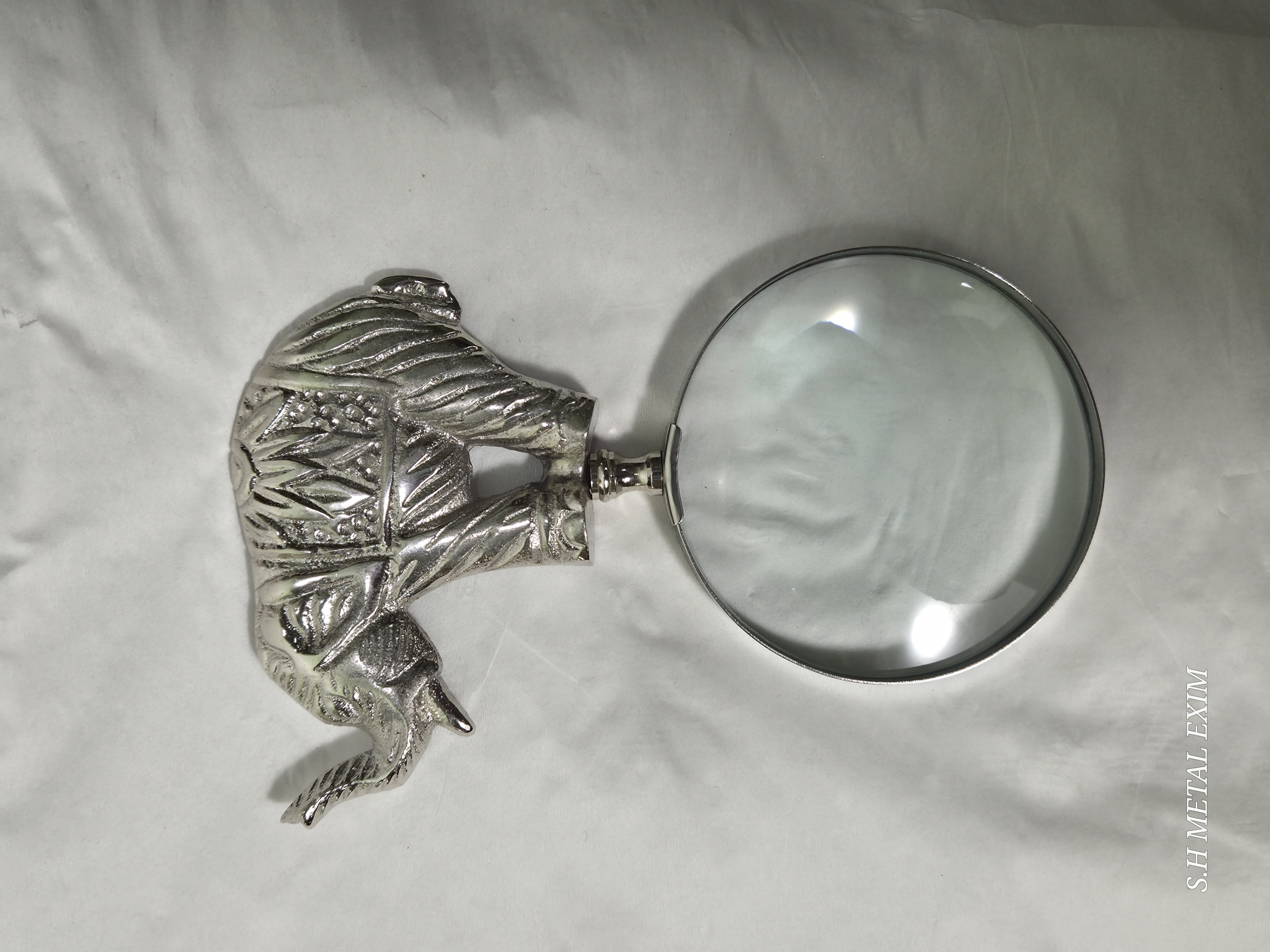 Navigating Legend: The Scholar’s Gilded Atlas and Elephant Magnifier